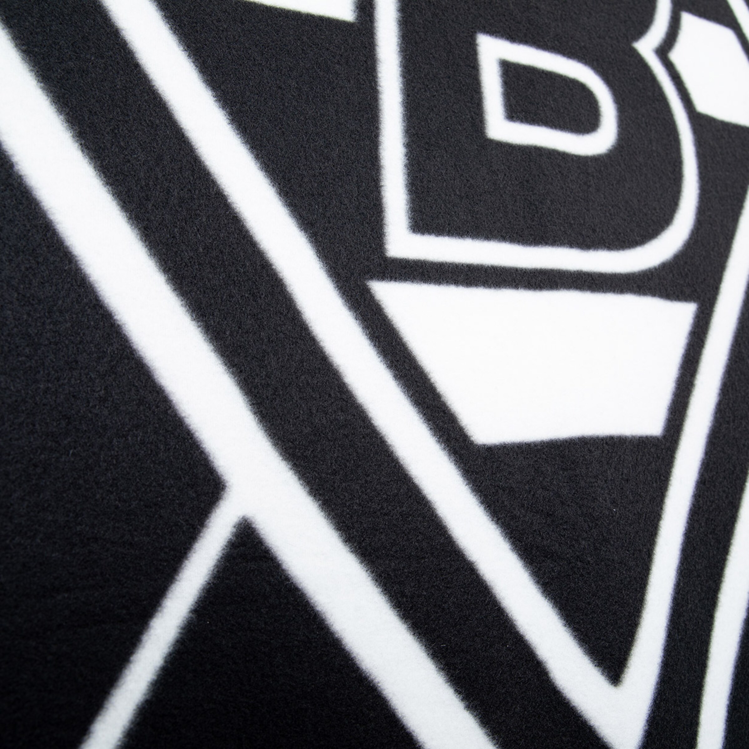 Nahaufnahme des Borussia Mönchengladbach Vereinslogows auf einem Textil.