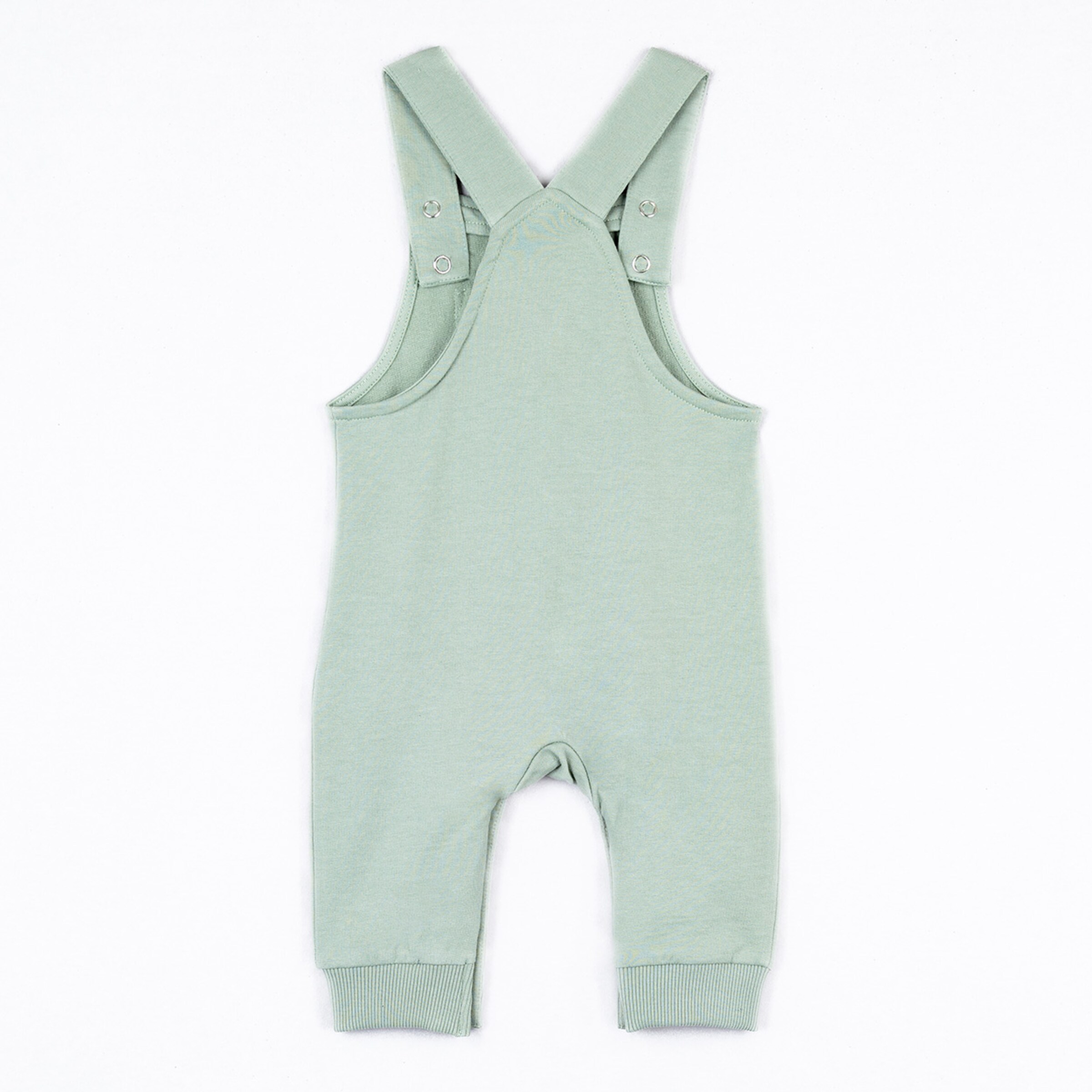 Hellgrüne Latzhose für Kleinkinder mit klassischen Trägern und Gummibund.