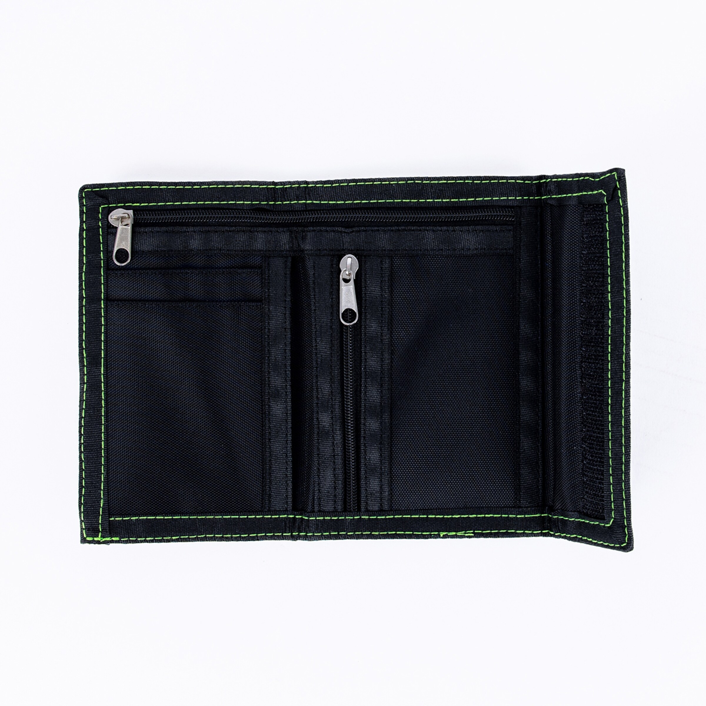 Open, tri-fold black nylon wallet with neon green stitching and two zip compartments, lying on a white background.
