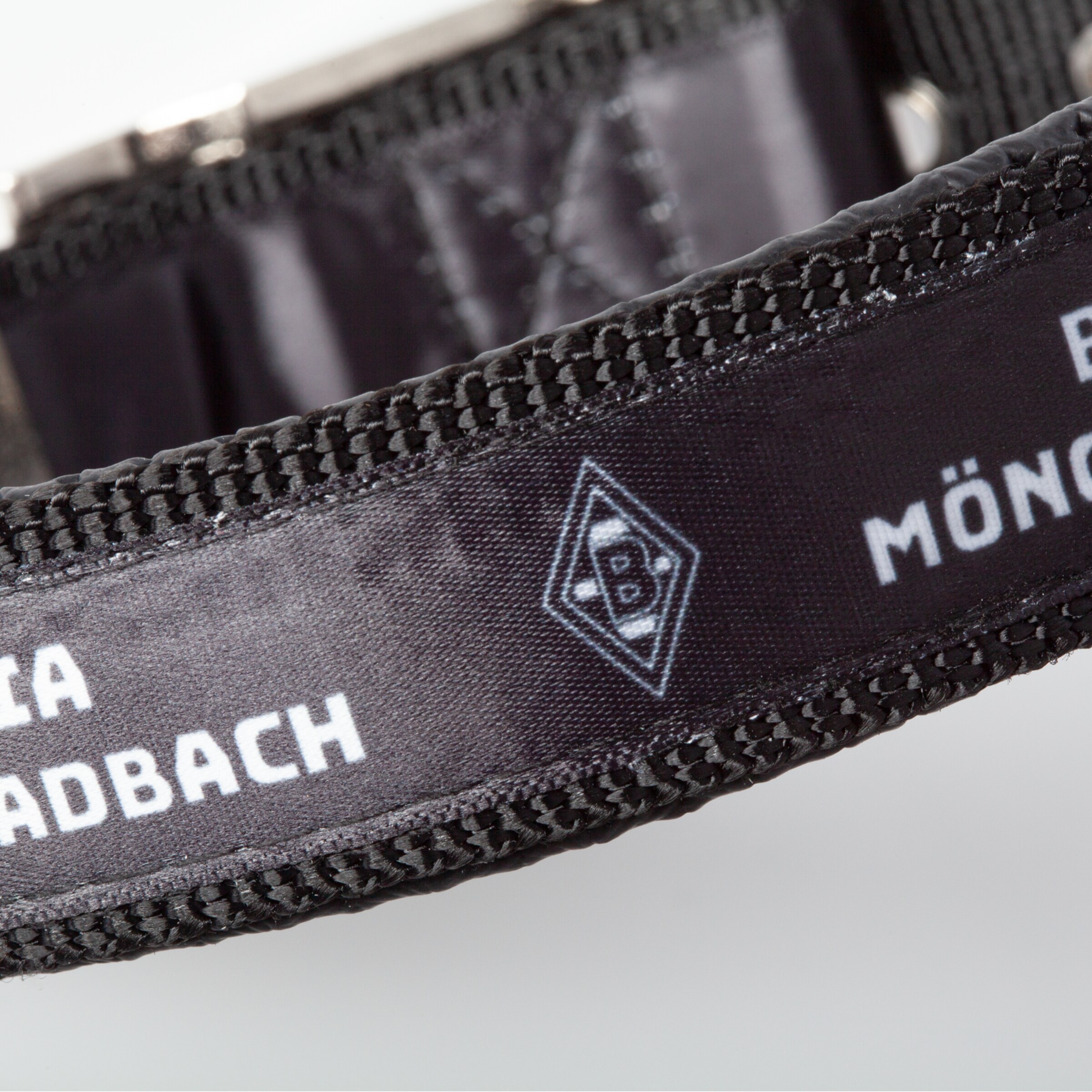 Black bracelet with Borussia Mönchengladbach text and the club logo.