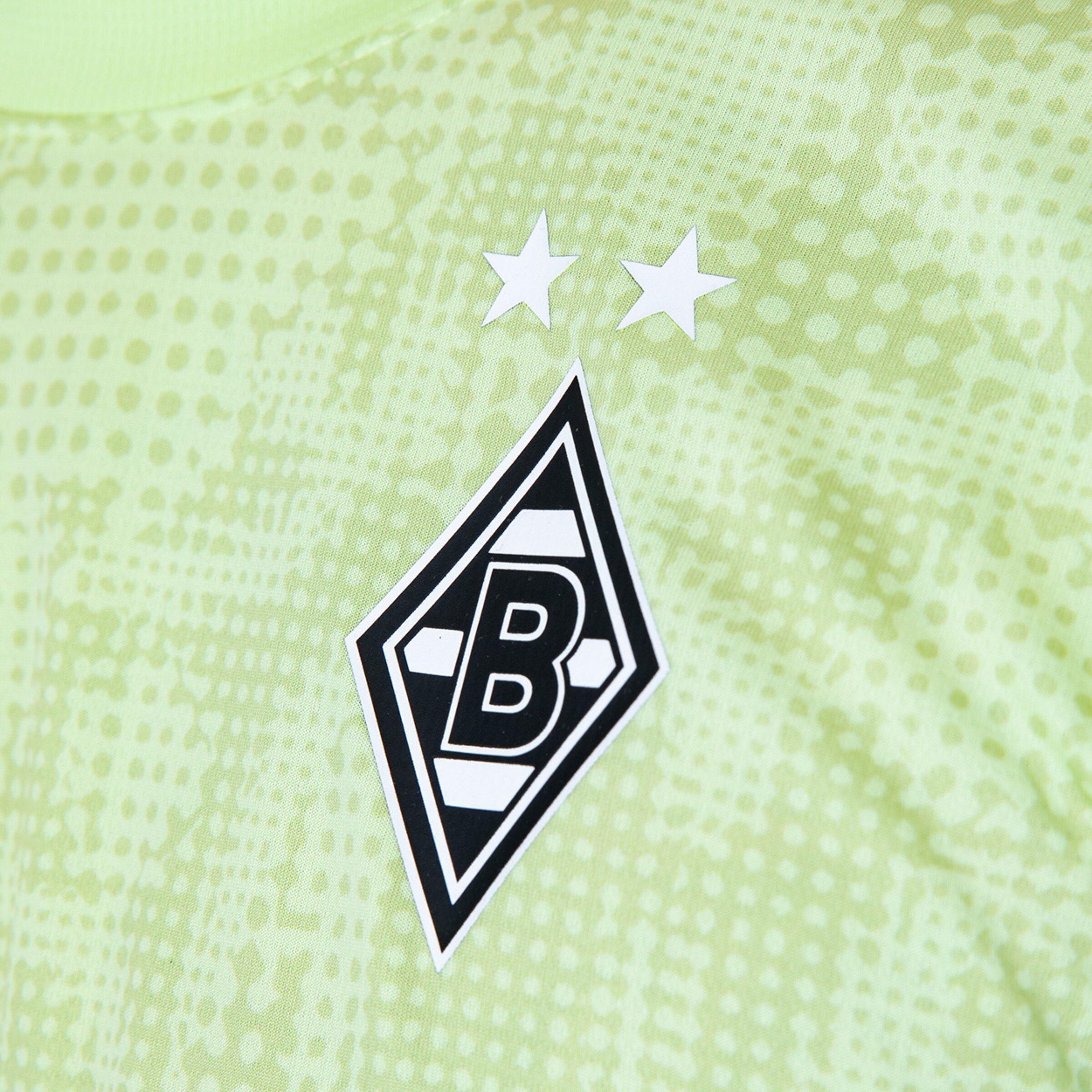 Das Vereinswappen von Borussia Mönchengladbach in Schwarz-Weiß mit zwei Sternen.