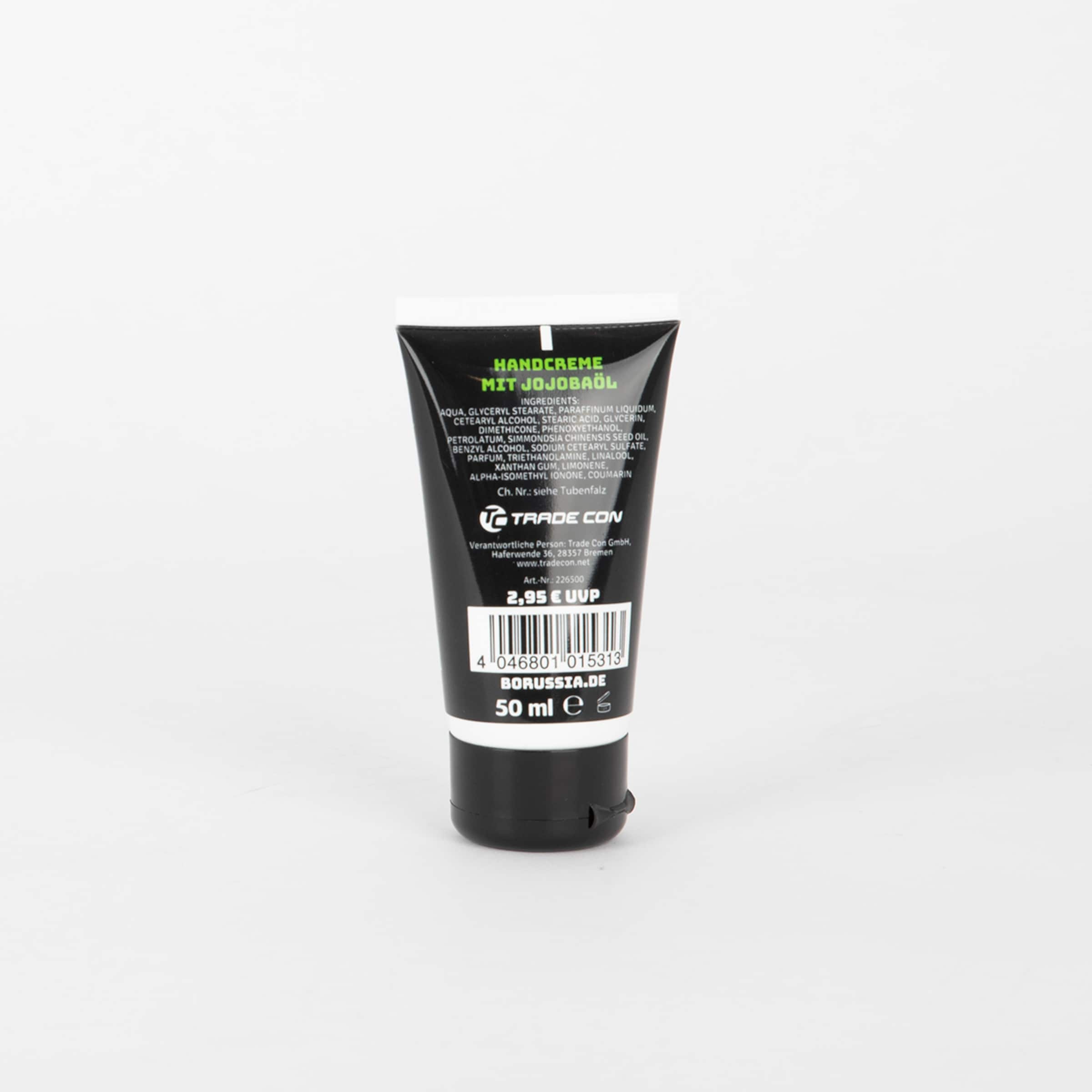 Rückseite einer schwarzen Tube Handcreme mit Jojobaöl (50 ml) von Borussia.de mit Inhaltsstoffen, Barcode und Trade Con Logo.