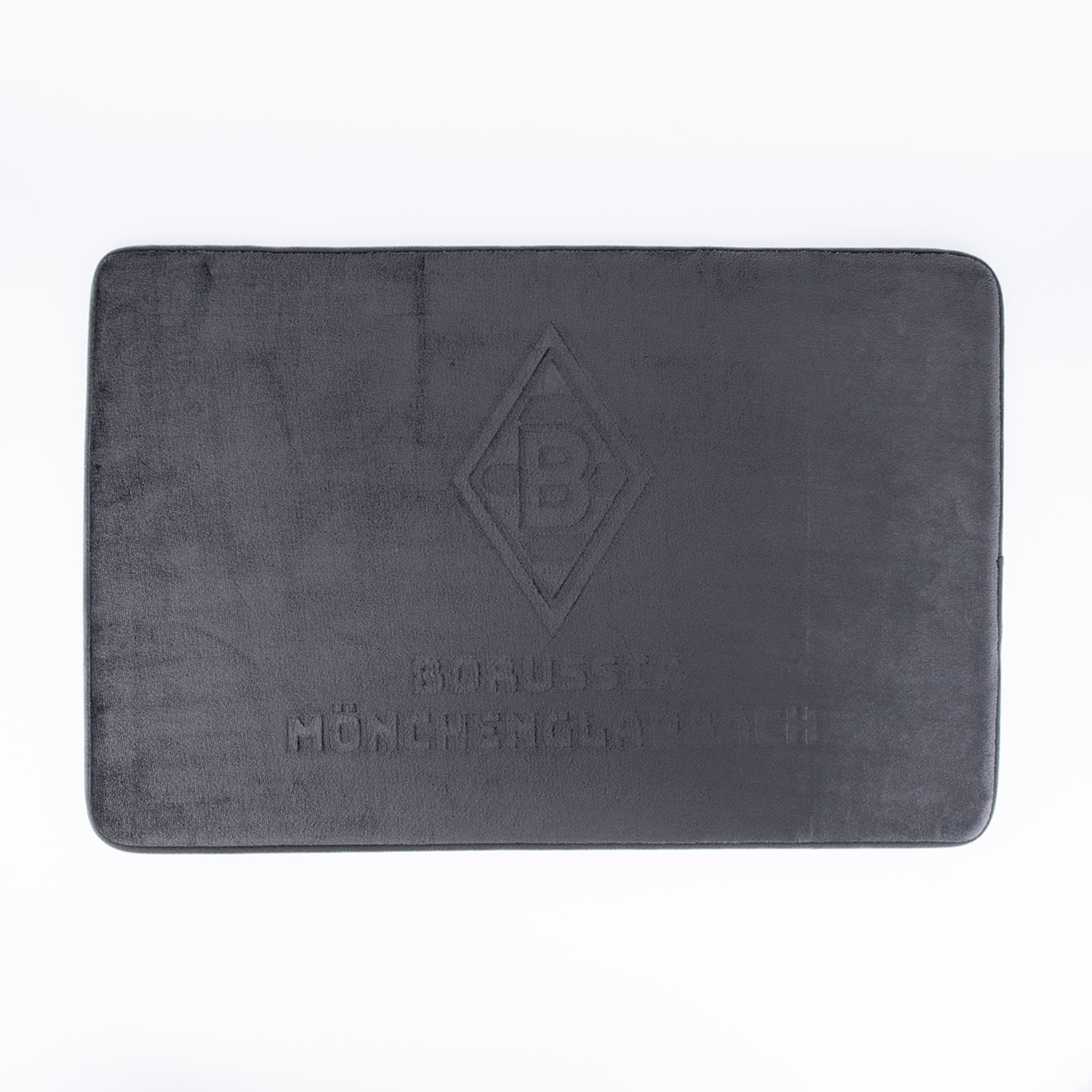 Eine dunkelgraue, rechteckige Matte mit einem eingeprägten Borussia Mönchengladbach Logo (Rautenform mit einem 'B' darin) und dem Schriftzug 'BORUSSIA MÖNCHENGLADBACH' darunter, auf einem weißen Hintergrund.