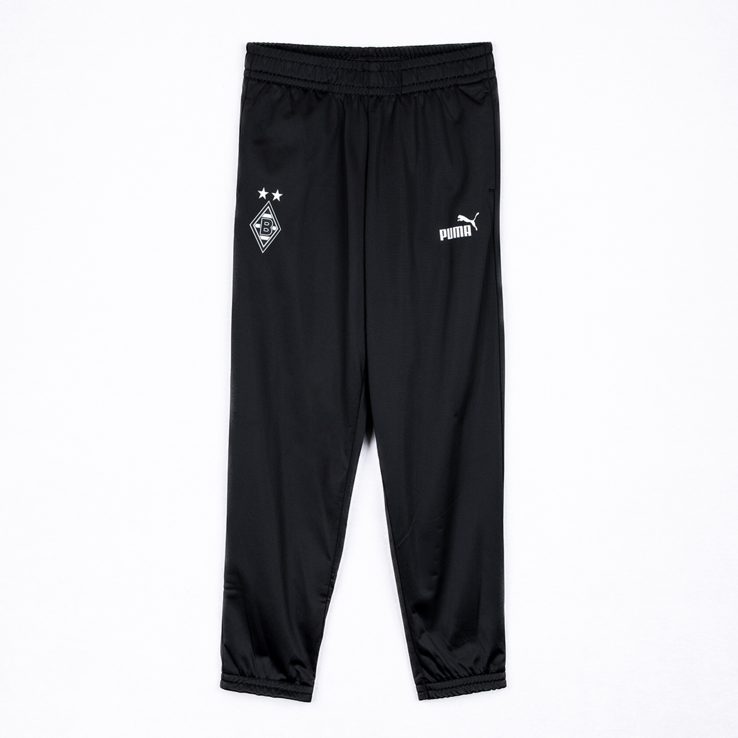 Black Puma training pants for Borussia Mönchengladbach featuring the club crest and two stars on a white background.