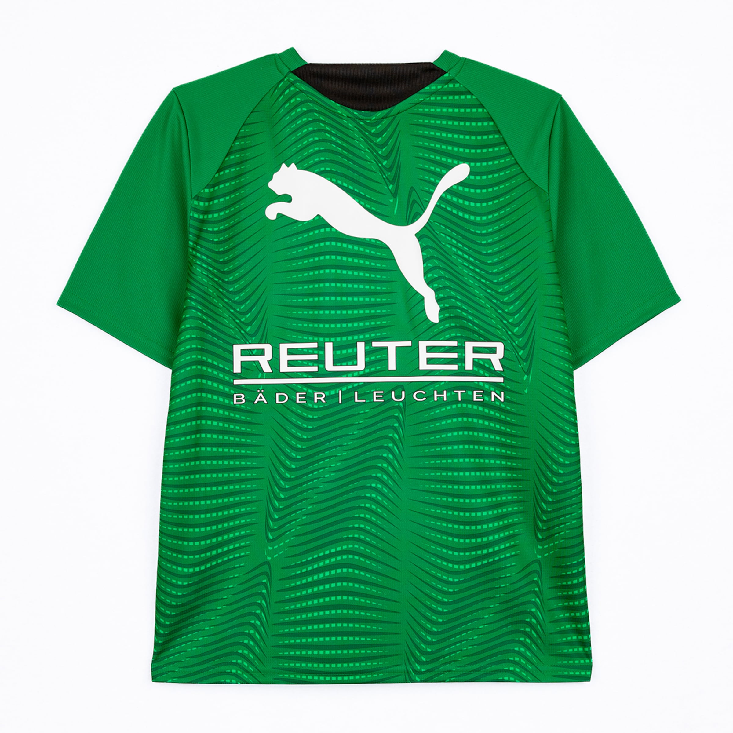 A green short-sleeved football jersey with a black collar. It features a white Puma logo and white 'REUTER BÄDER | LEUCHTEN' text. The jersey has a subtle pattern of dark green wavy lines.