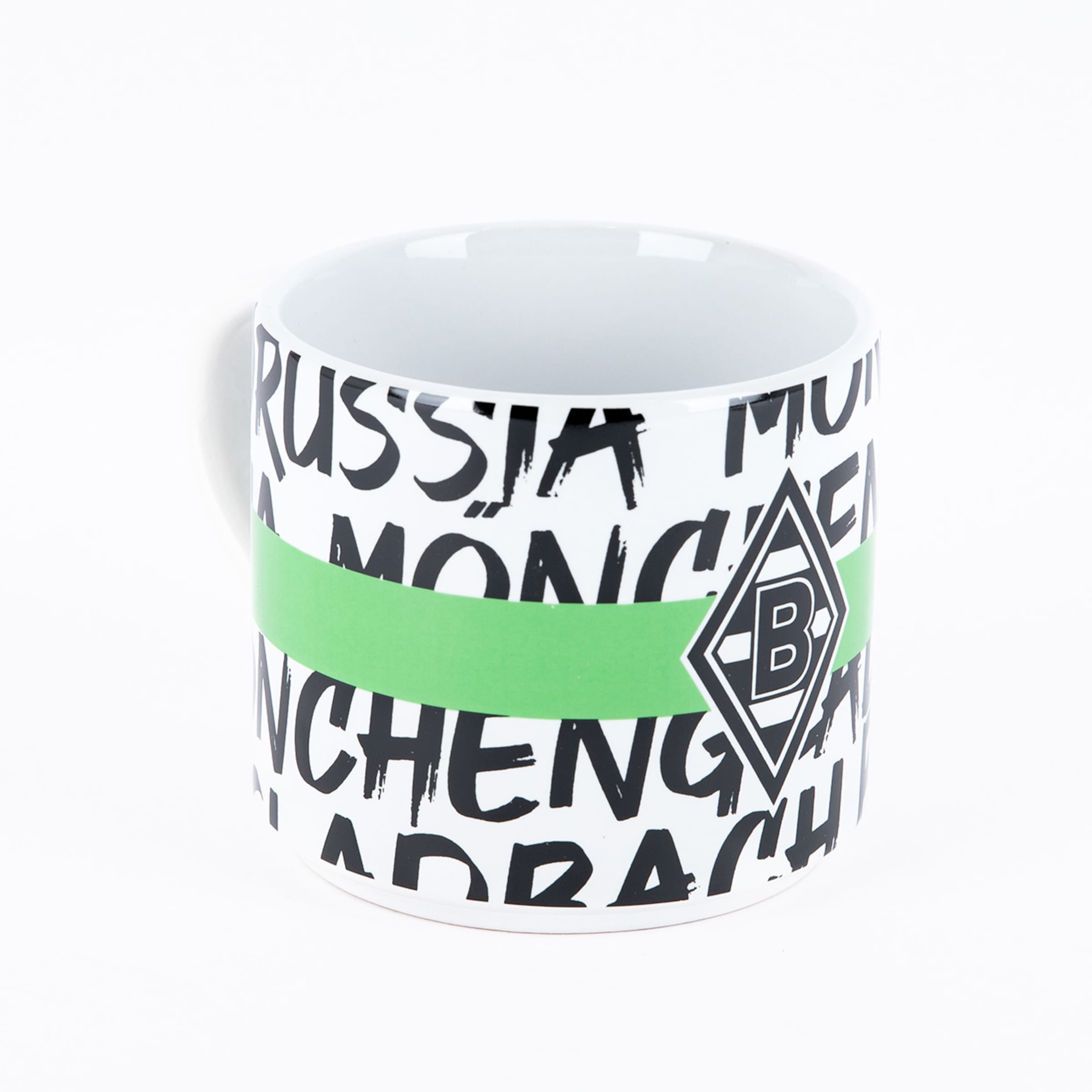 Weiße Tasse mit schwarzem Borussia Mönchengladbach Schriftzug, grünem Band und Vereinslogo vor weißem Hintergrund.