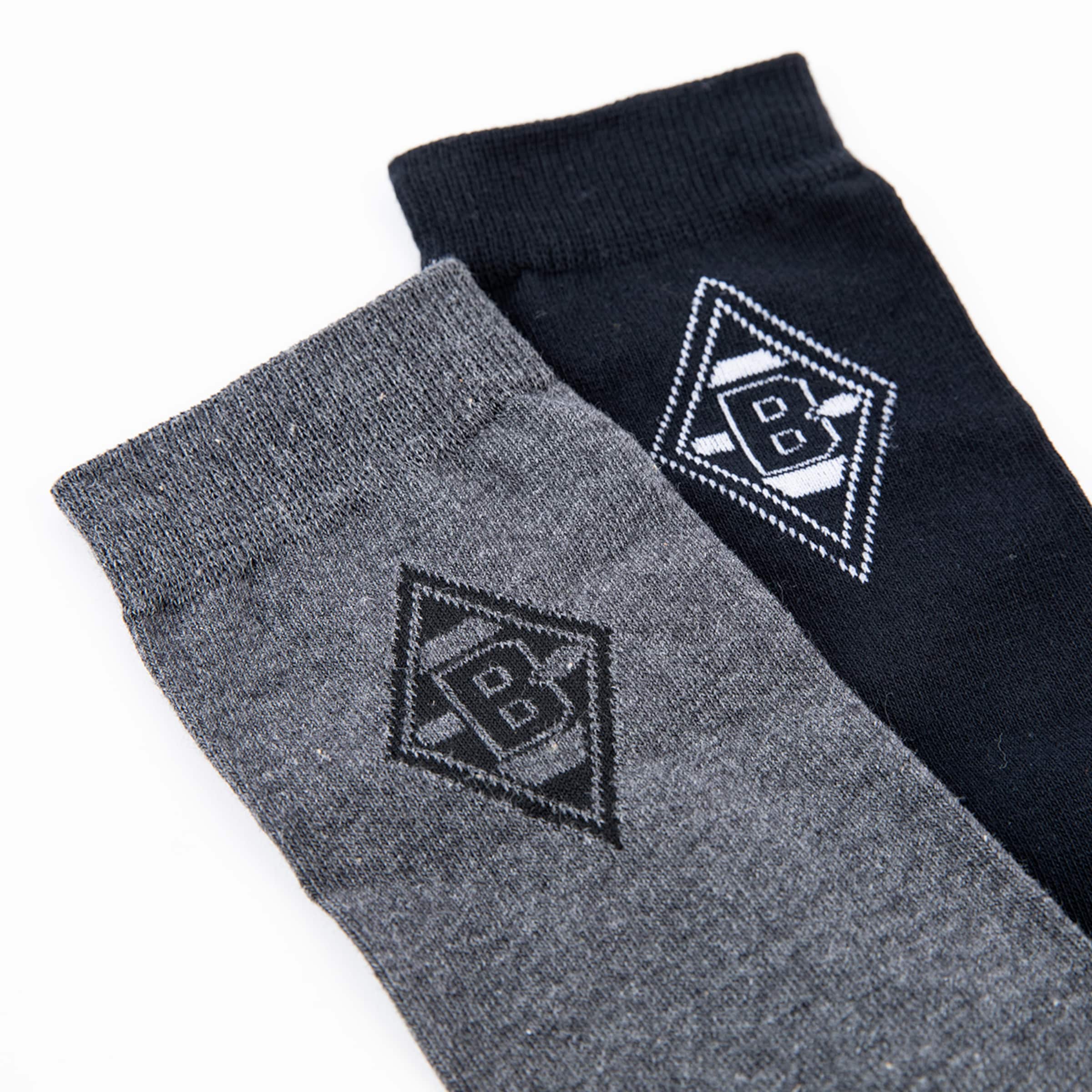 Gray and black socks featuring the Borussia Mönchengladbach logo.