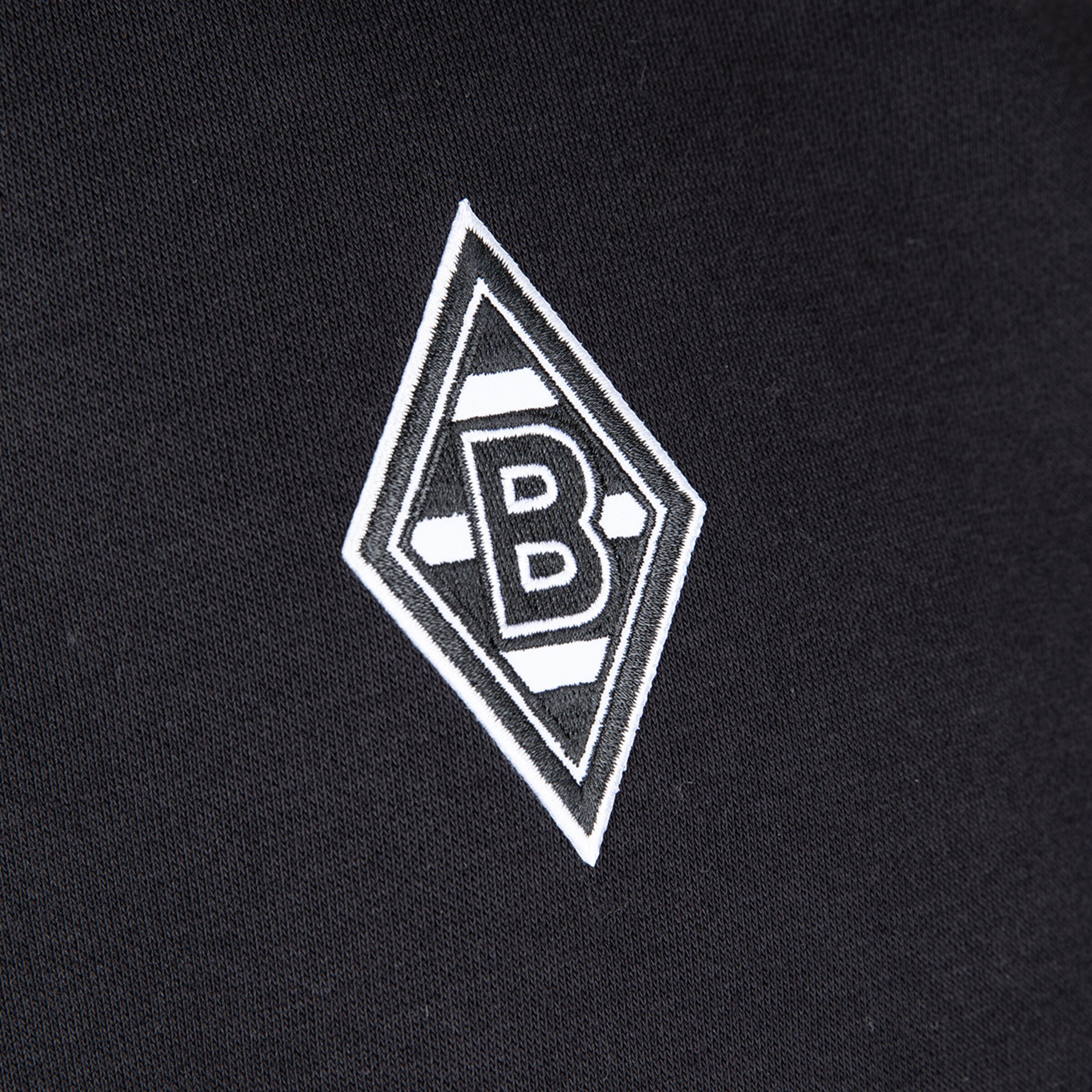 Das Logo von Borussia Mönchengladbach in schwarz-weiß geformt wie ein Rautenmuster.