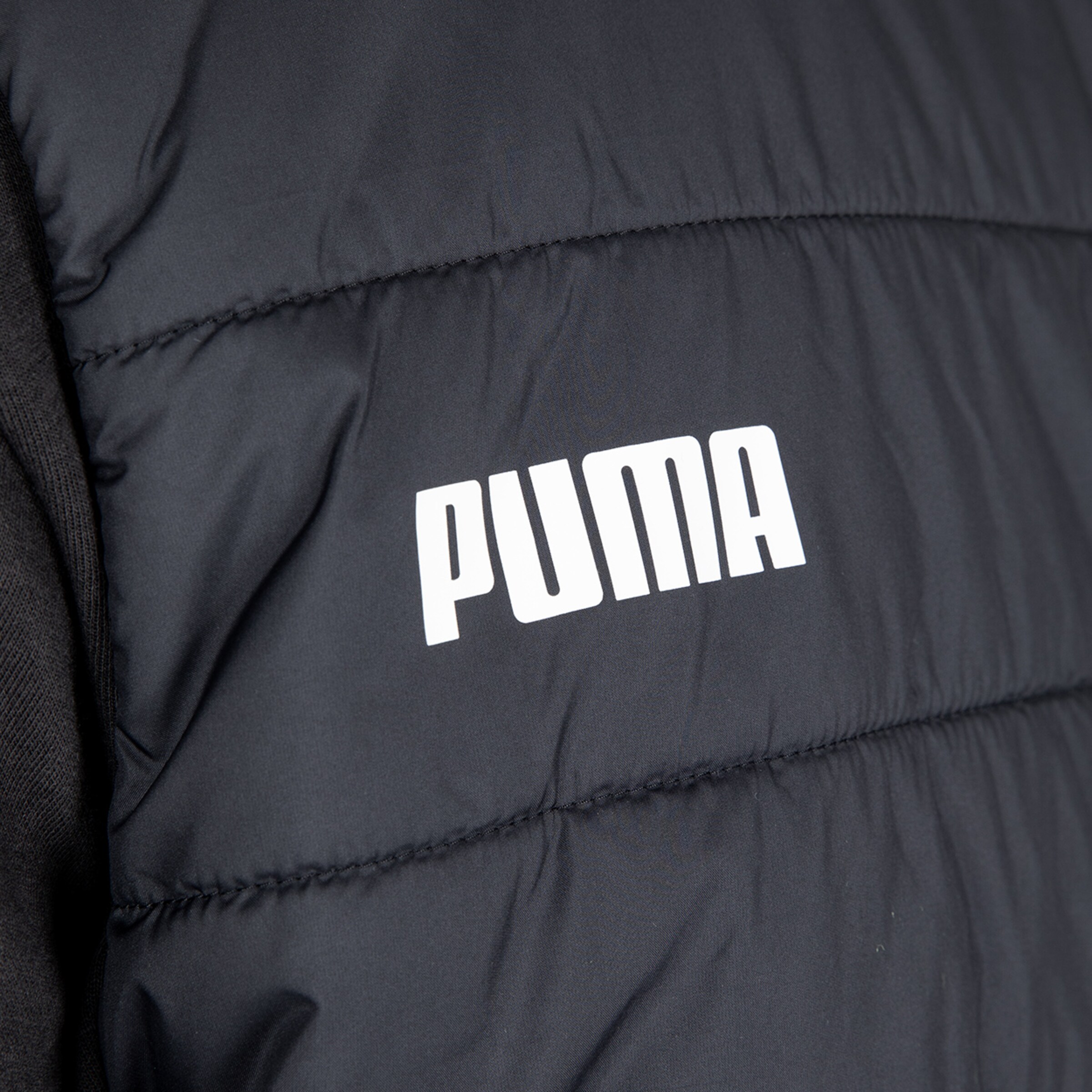 Dark gray jacket with printed PUMA logo.