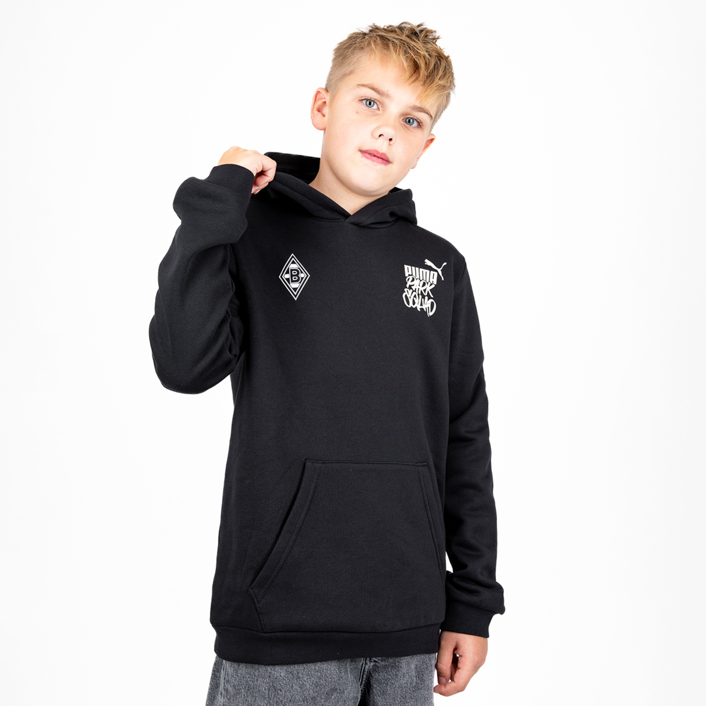 Boy wearing a black hoodie with Borussia Mönchengladbach logo.