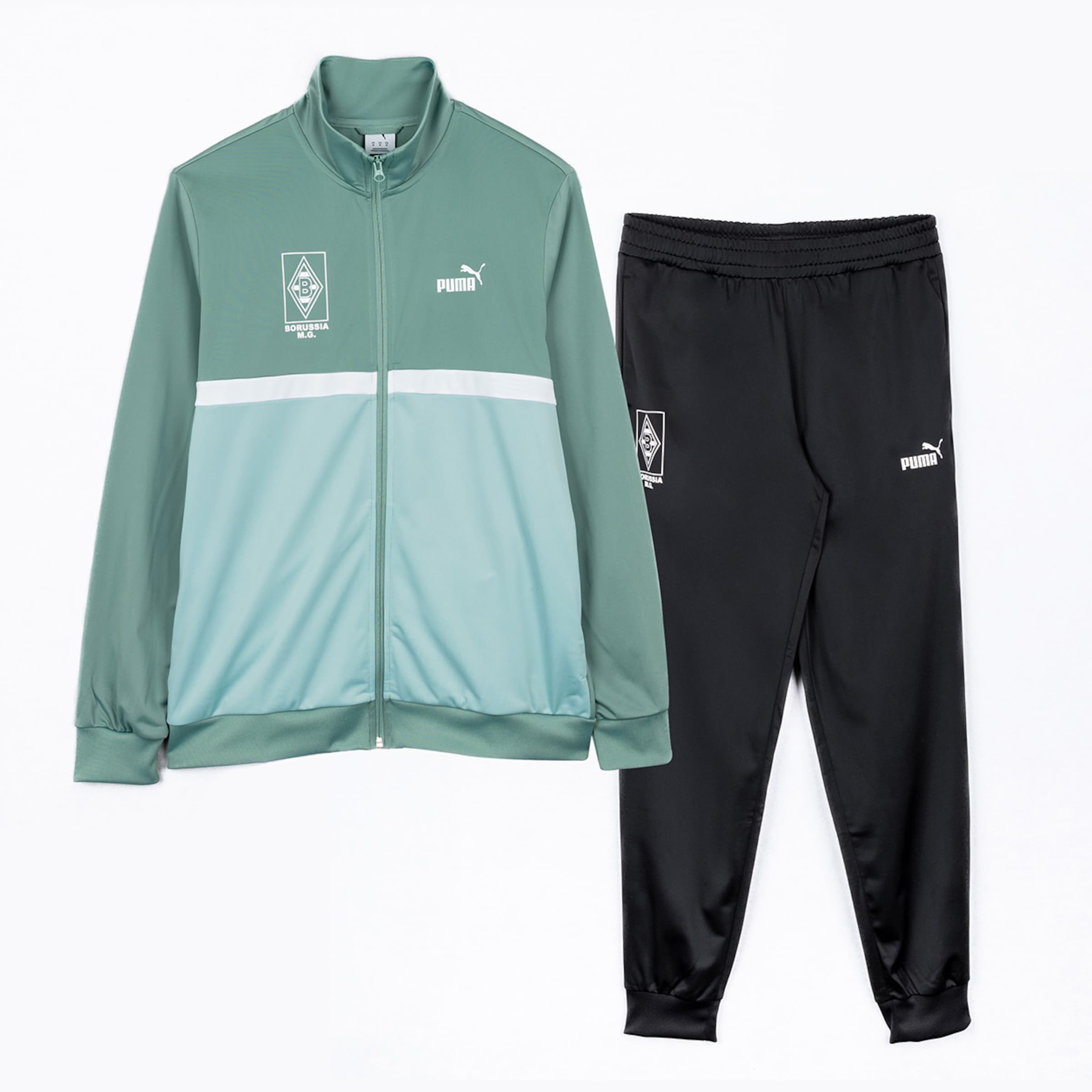 Borussia Mönchengladbach Puma tracksuit: Green jacket with a white chest stripe and black pants, both with the club crest and Puma logo.