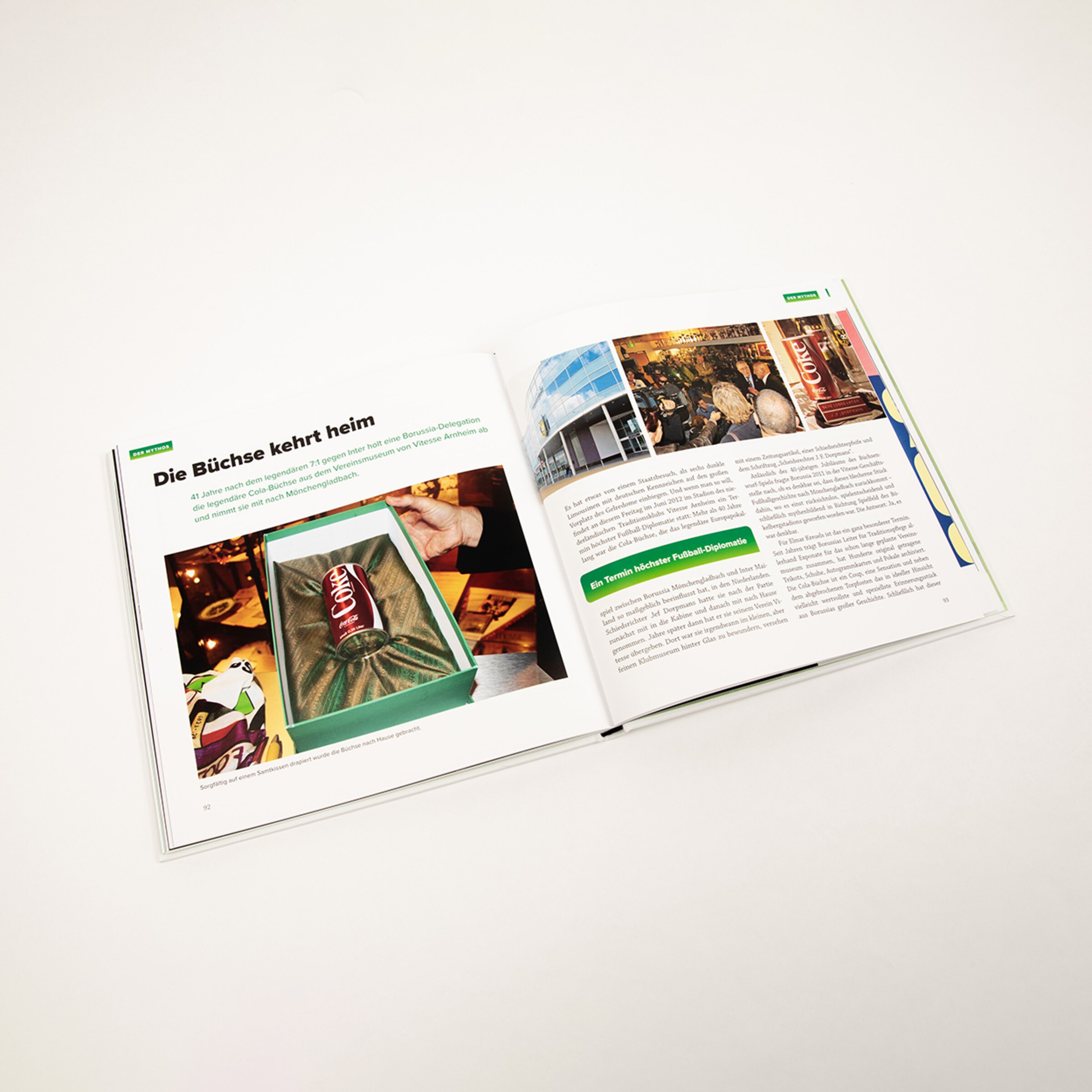 Two open book pages with text and images about the return of a beer can.