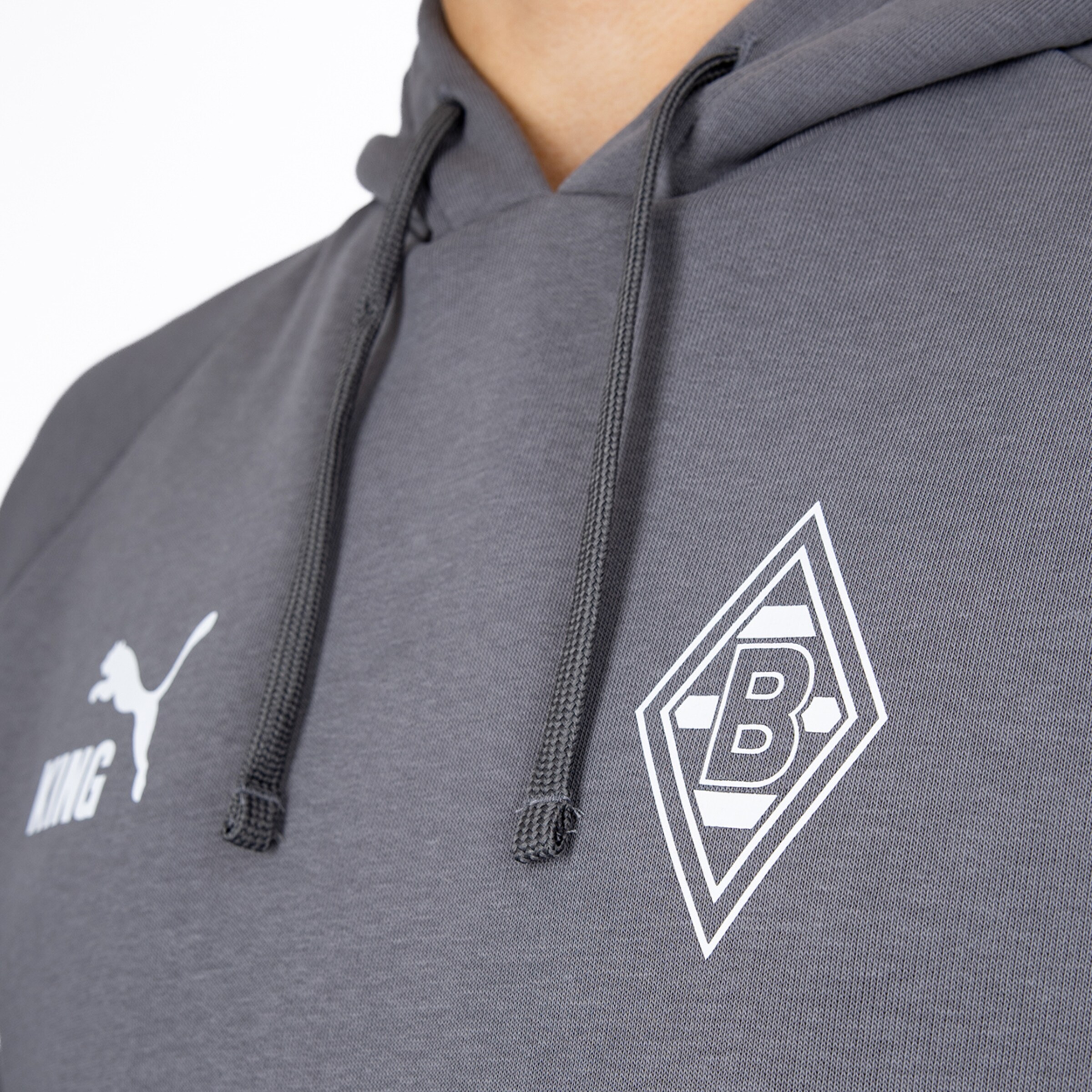 Gray Puma KING hoodie with the white Borussia Mönchengladbach diamond logo on the chest.