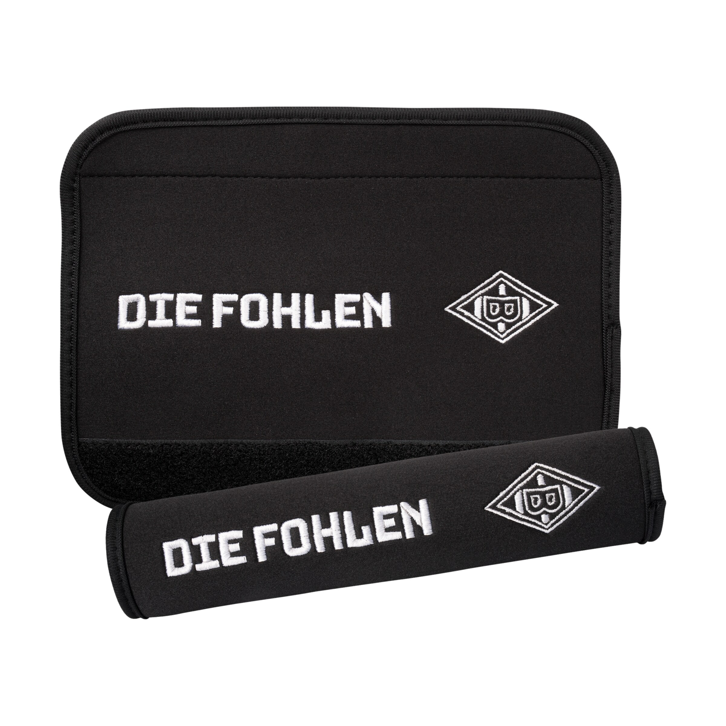 Black shin guards and sleeve featuring the text DIE FOHLEN and the club logo.
