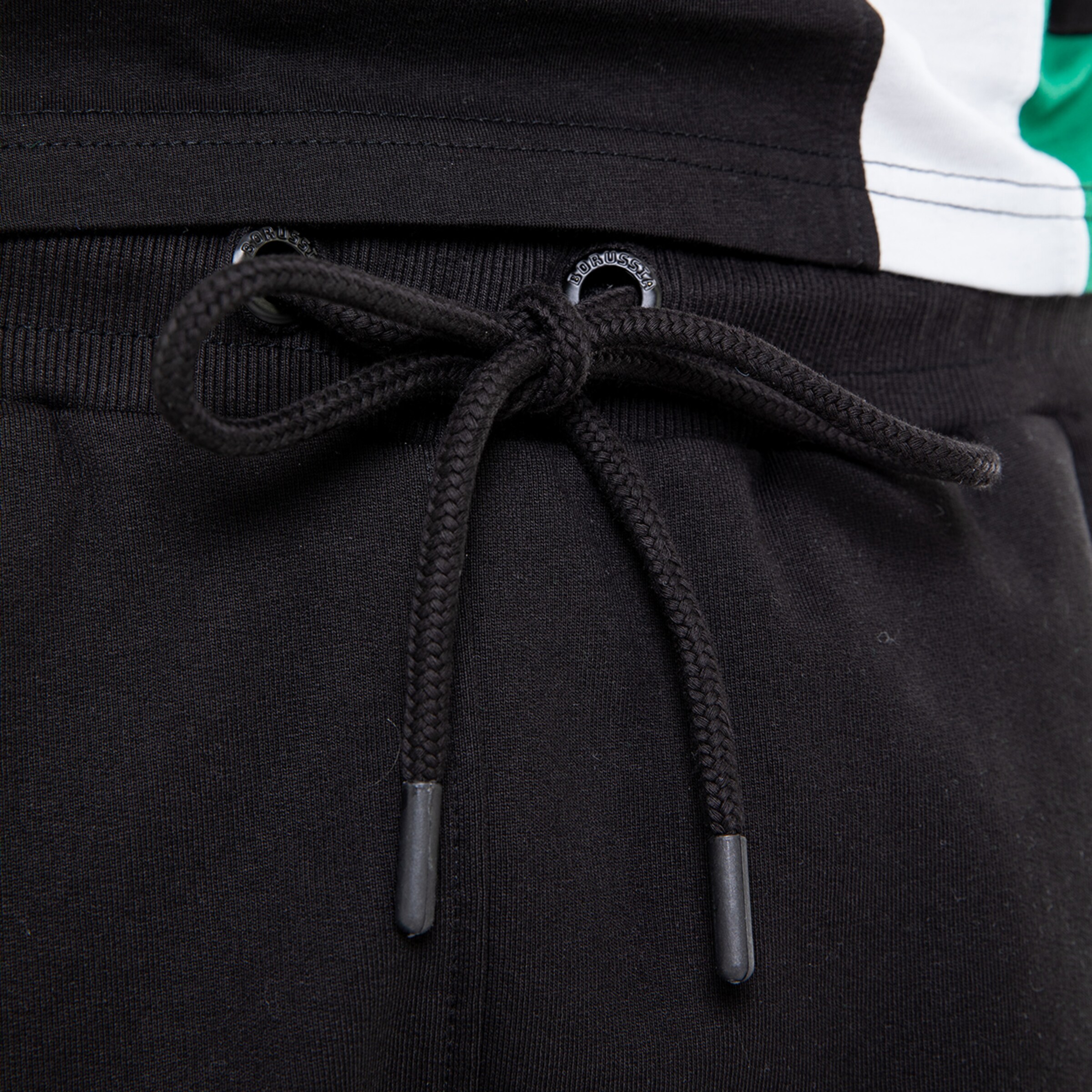 Schwarz-graue Jogginghose mit Schnürung.