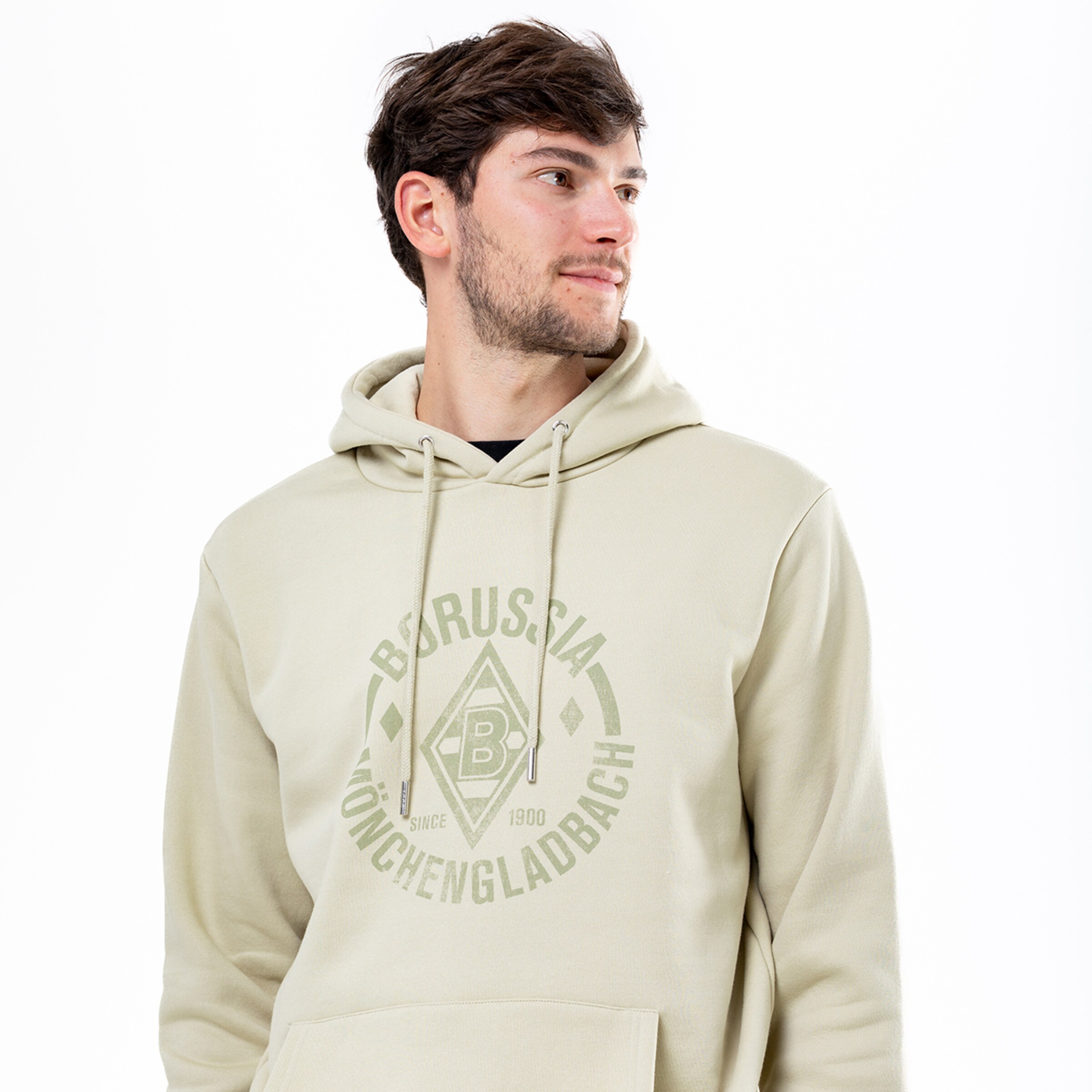 Man in beige hoodie with Borussia Mönchengladbach print