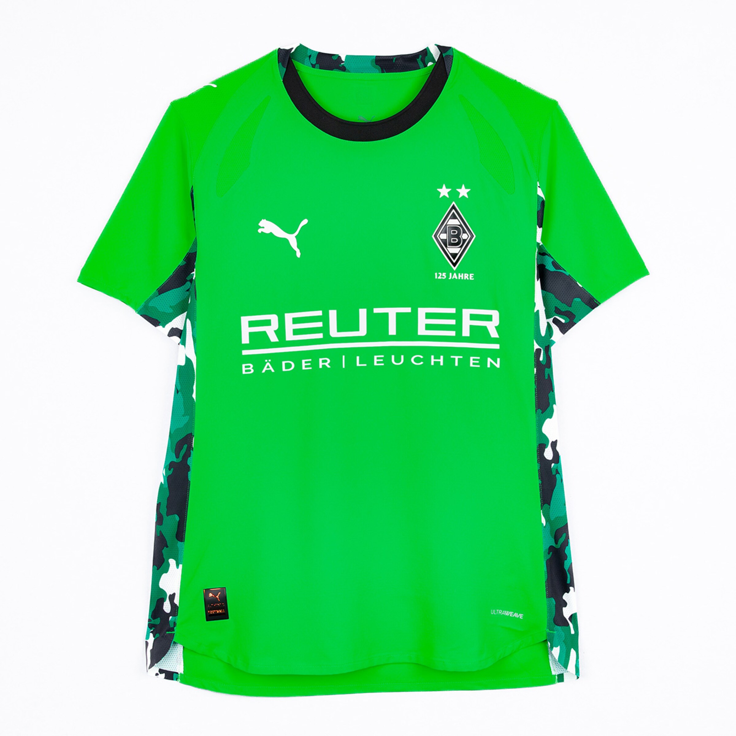 Green jersey with camouflage pattern and Puma logo.