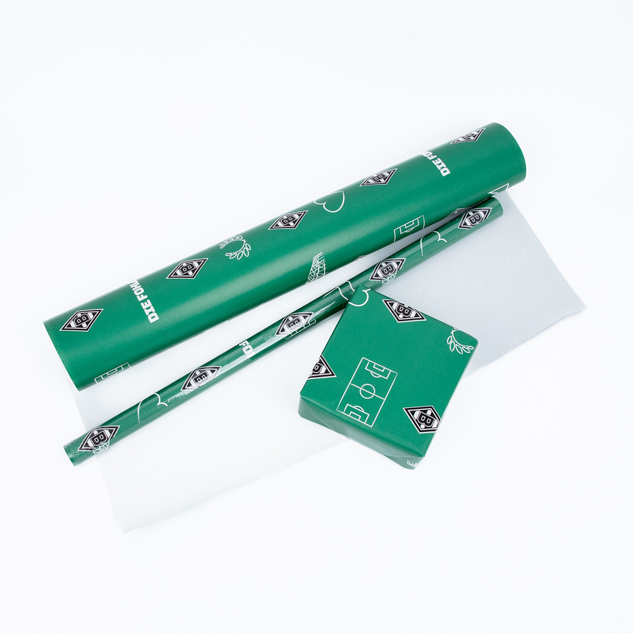 Geschenkpapier mit Borussia Mönchengladbach-Muster enthält Rollen und eine Schachtel.