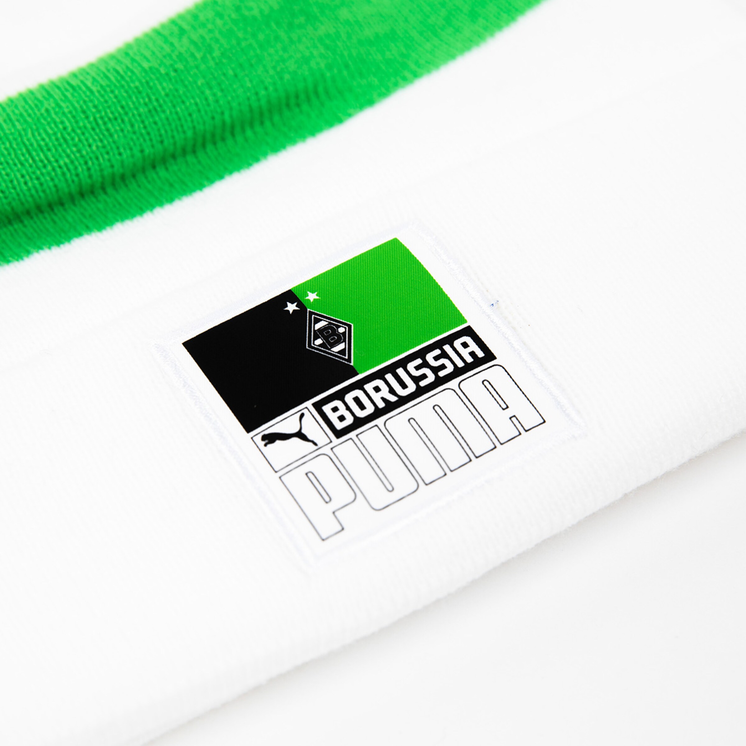 Logo der Borussia Mönchengladbach auf einem weißen Textilstück mit grünem Bündchen