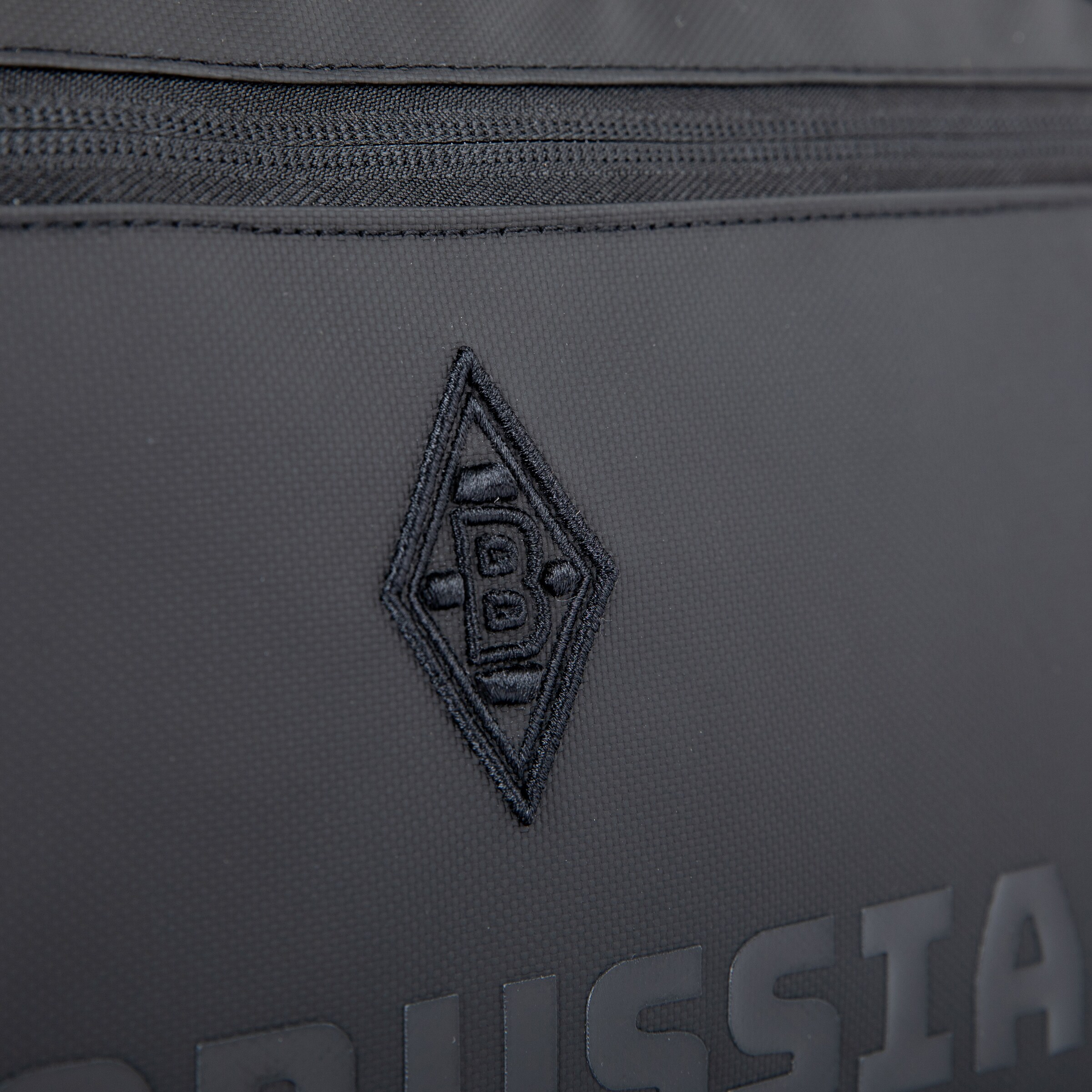 Schwarze Tasche mit eingewebtem Borussia Mönchengladbach-Logo.
