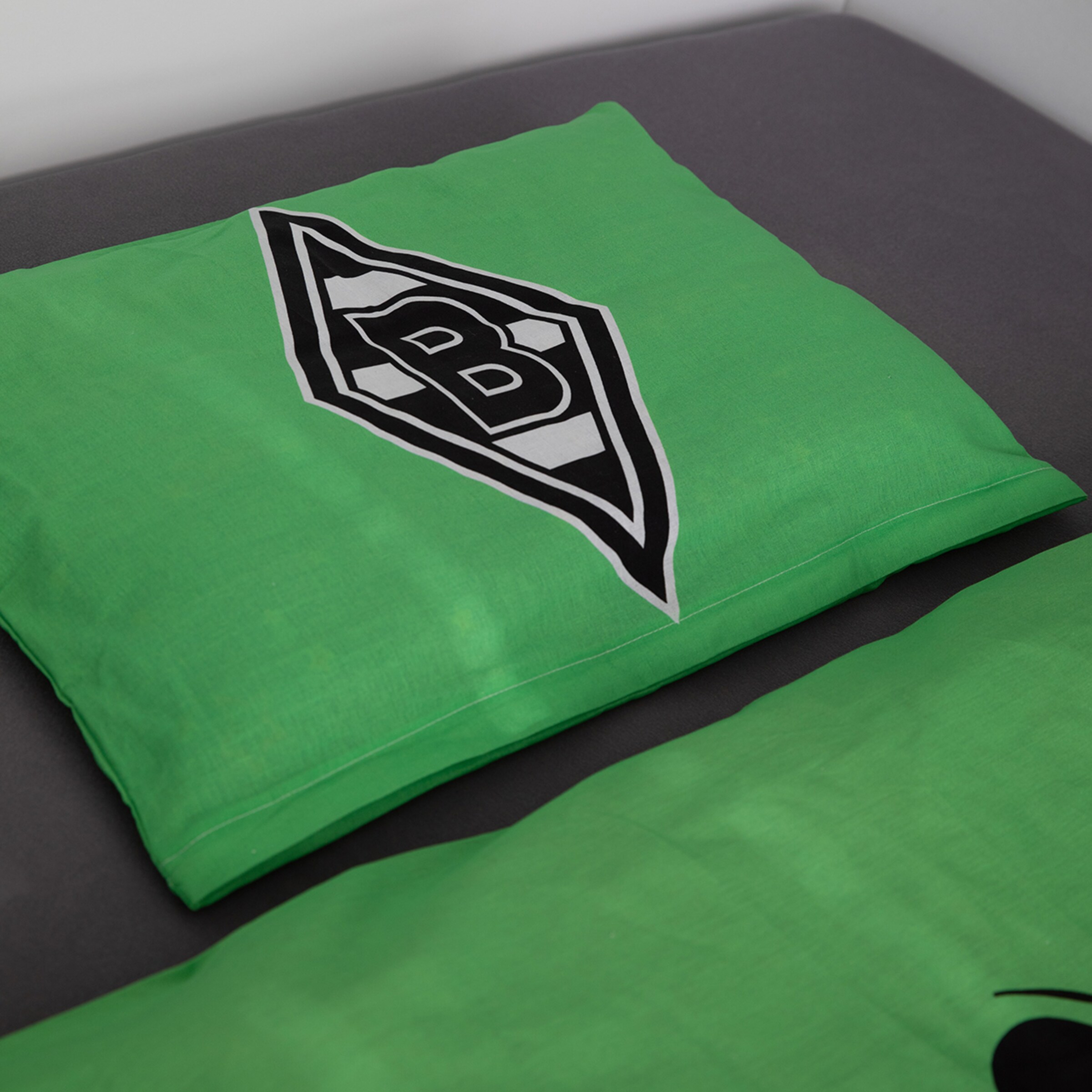 Green pillowcase with Borussia Mönchengladbach logo