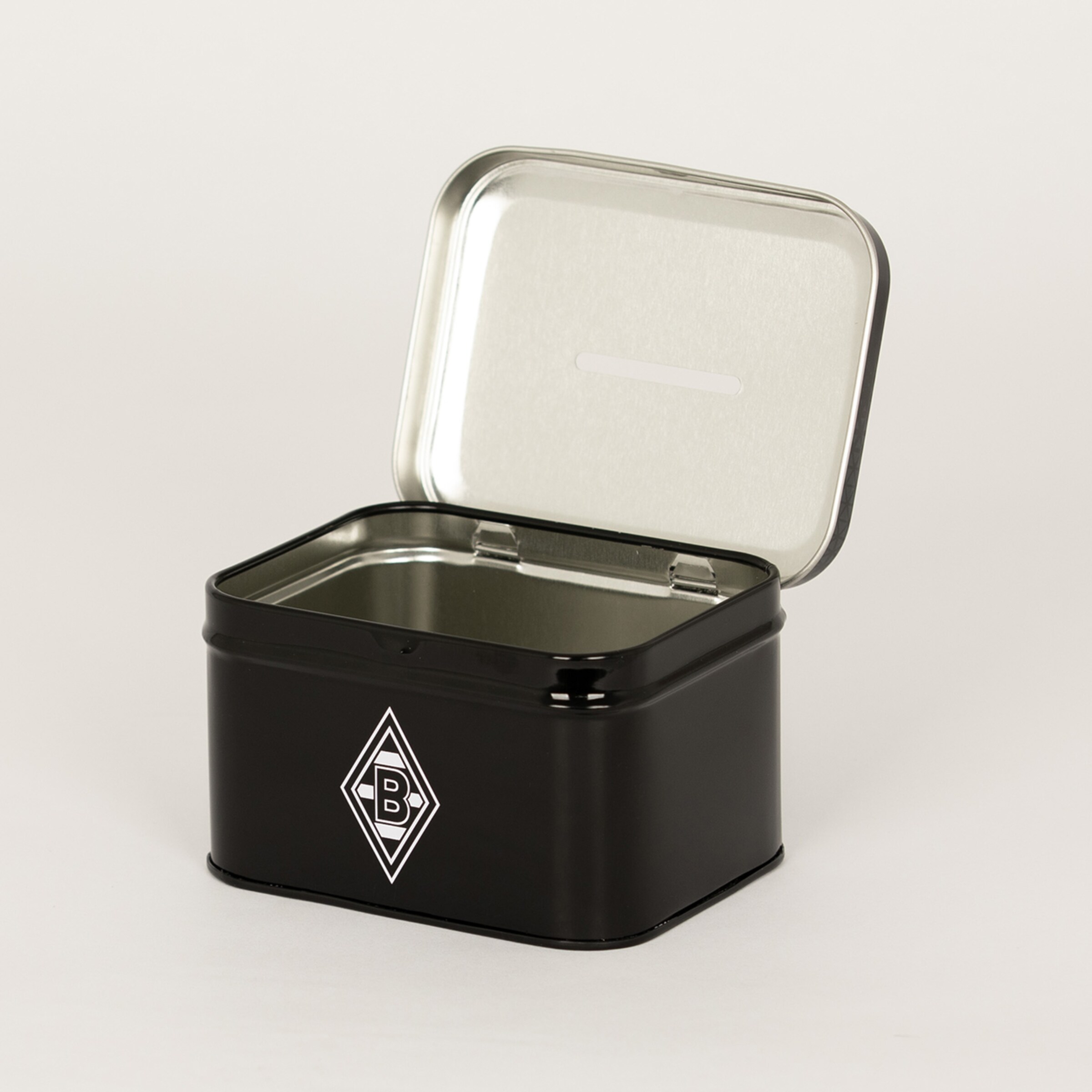 Open black metal money box with a coin slot in the lid and the white Borussia Mönchengladbach logo on the front.