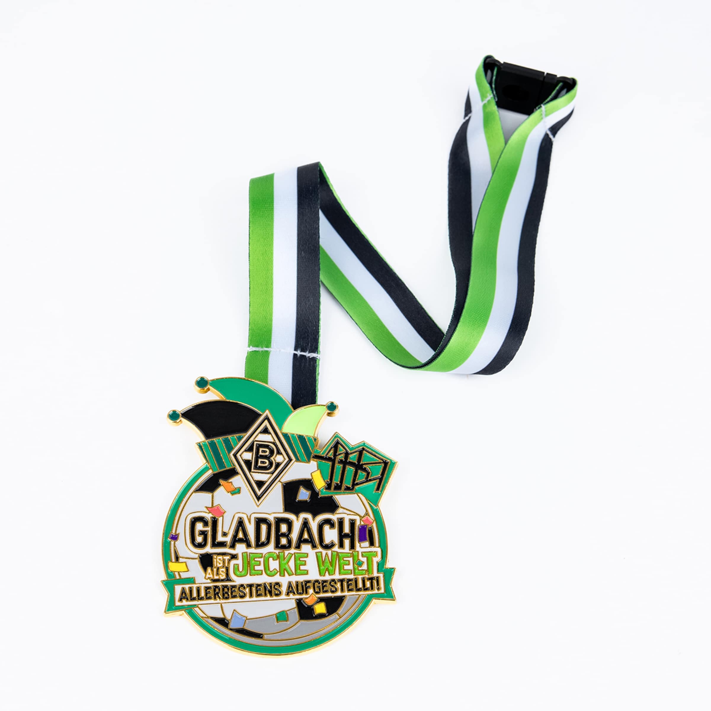 Carnival medal from Borussia Mönchengladbach with a striped ribbon and the slogan “Gladbach ist als jecke Welt allerbestens aufgestellt!”.