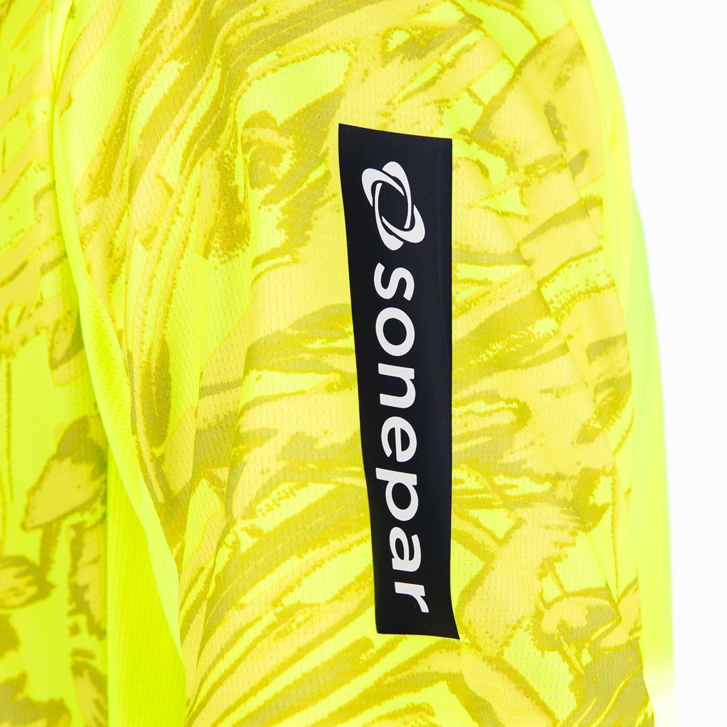 Yellow sports jacket with Sonepar logo on the left sleeve.