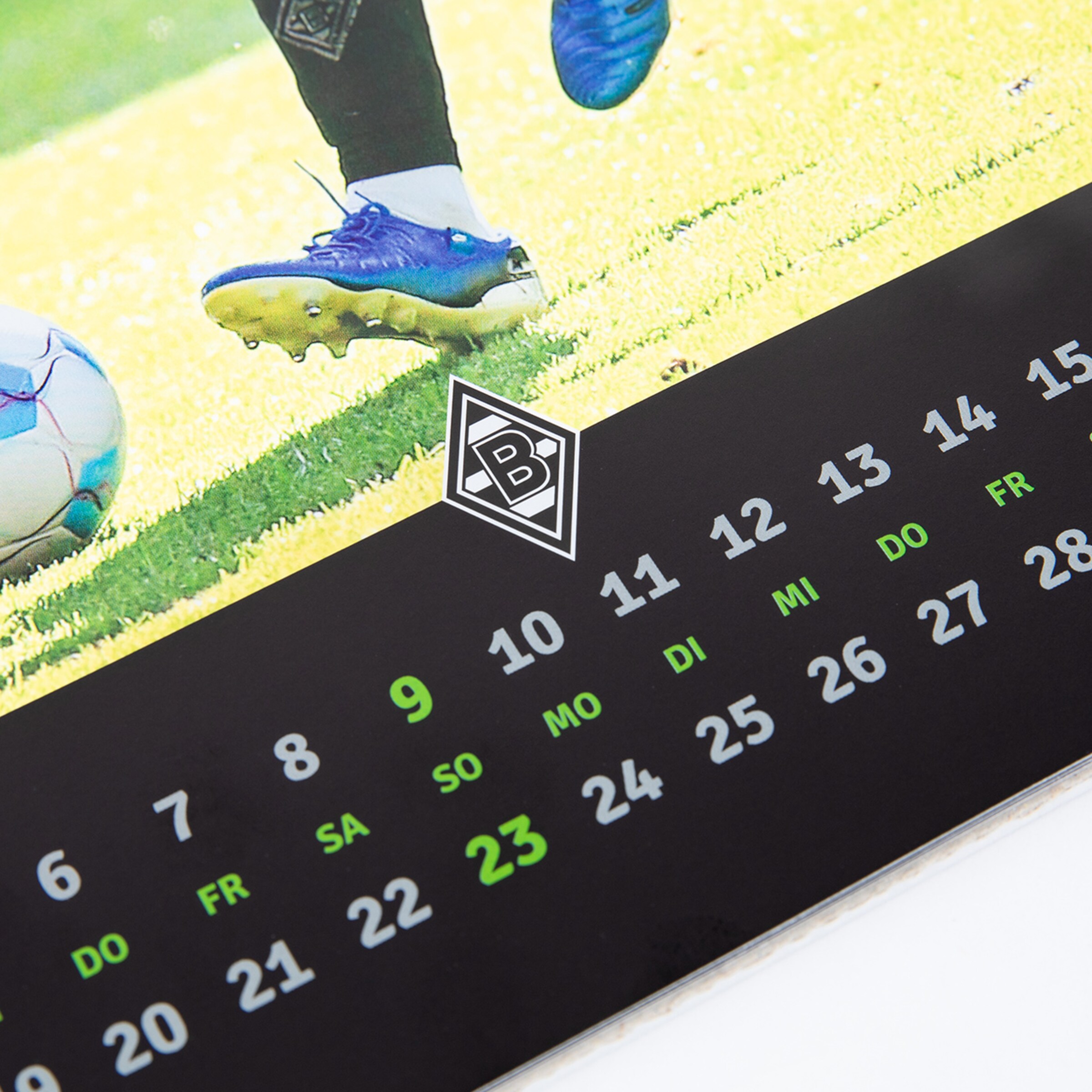 Kalenderblatt mit Fußballmotiven und dem Borussia Mönchengladbach-Logo.