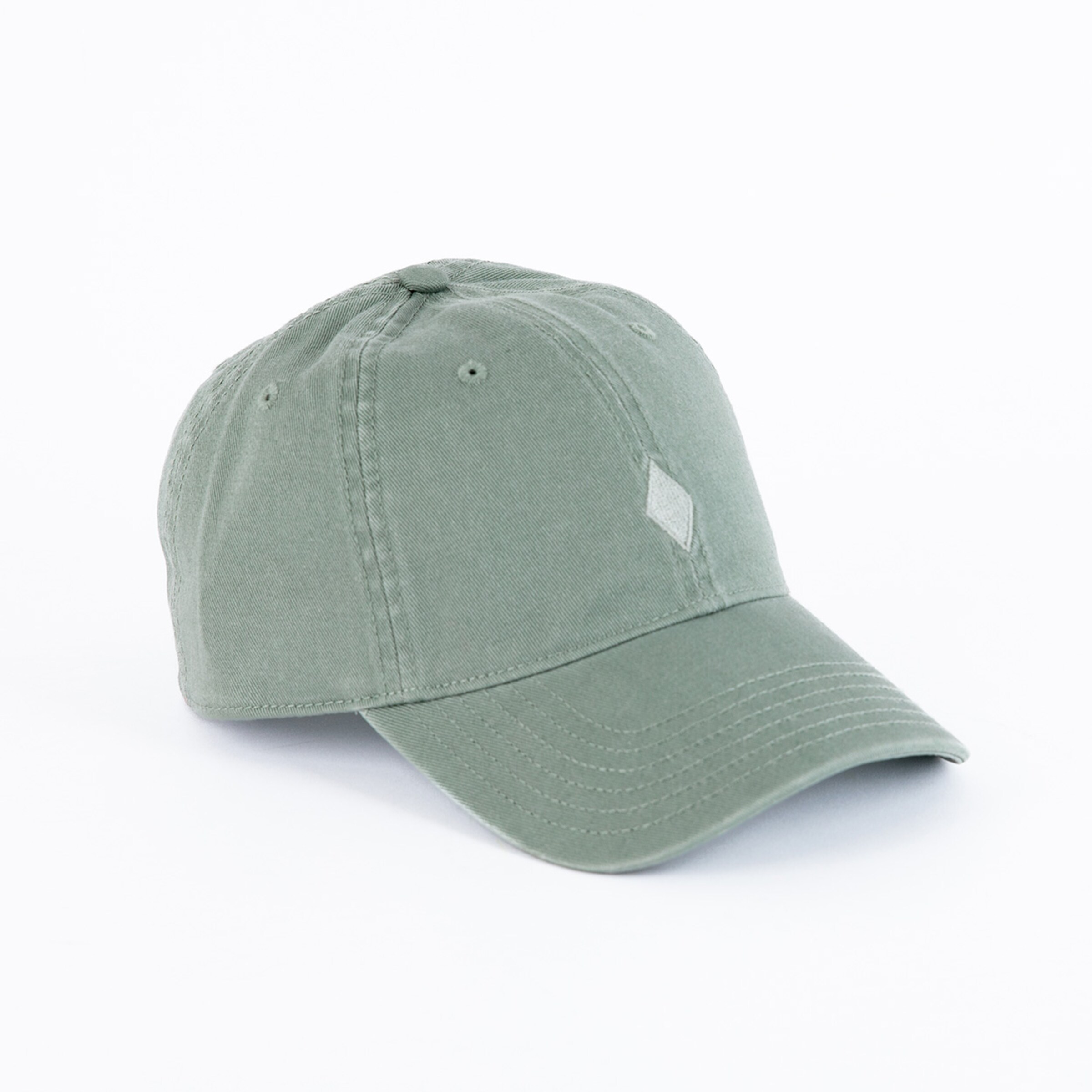 Green baseball cap with a curved brim and simple shape.