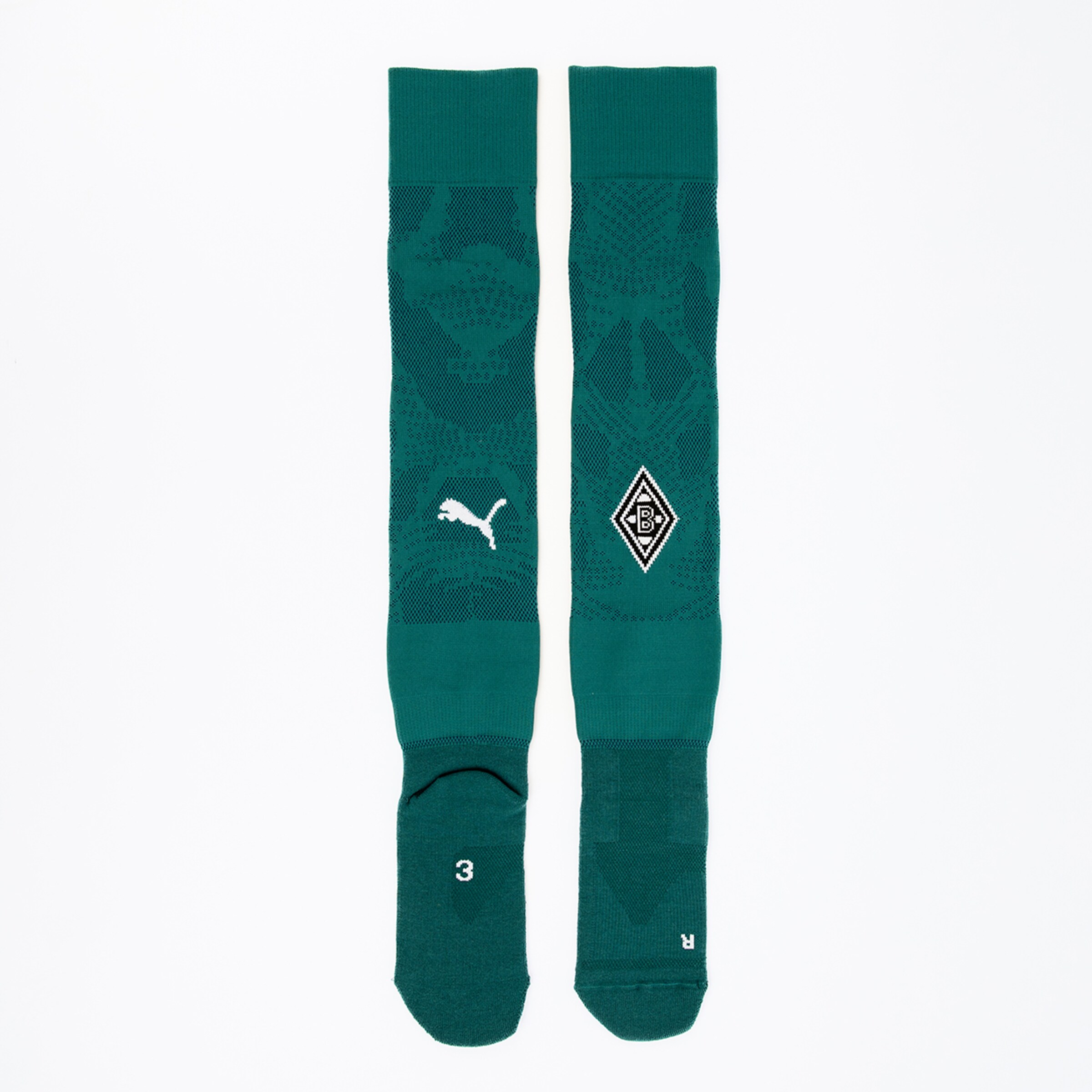 Grüne Socken mit Puma-Logo und Borussia Mönchengladbach-Wappen.
