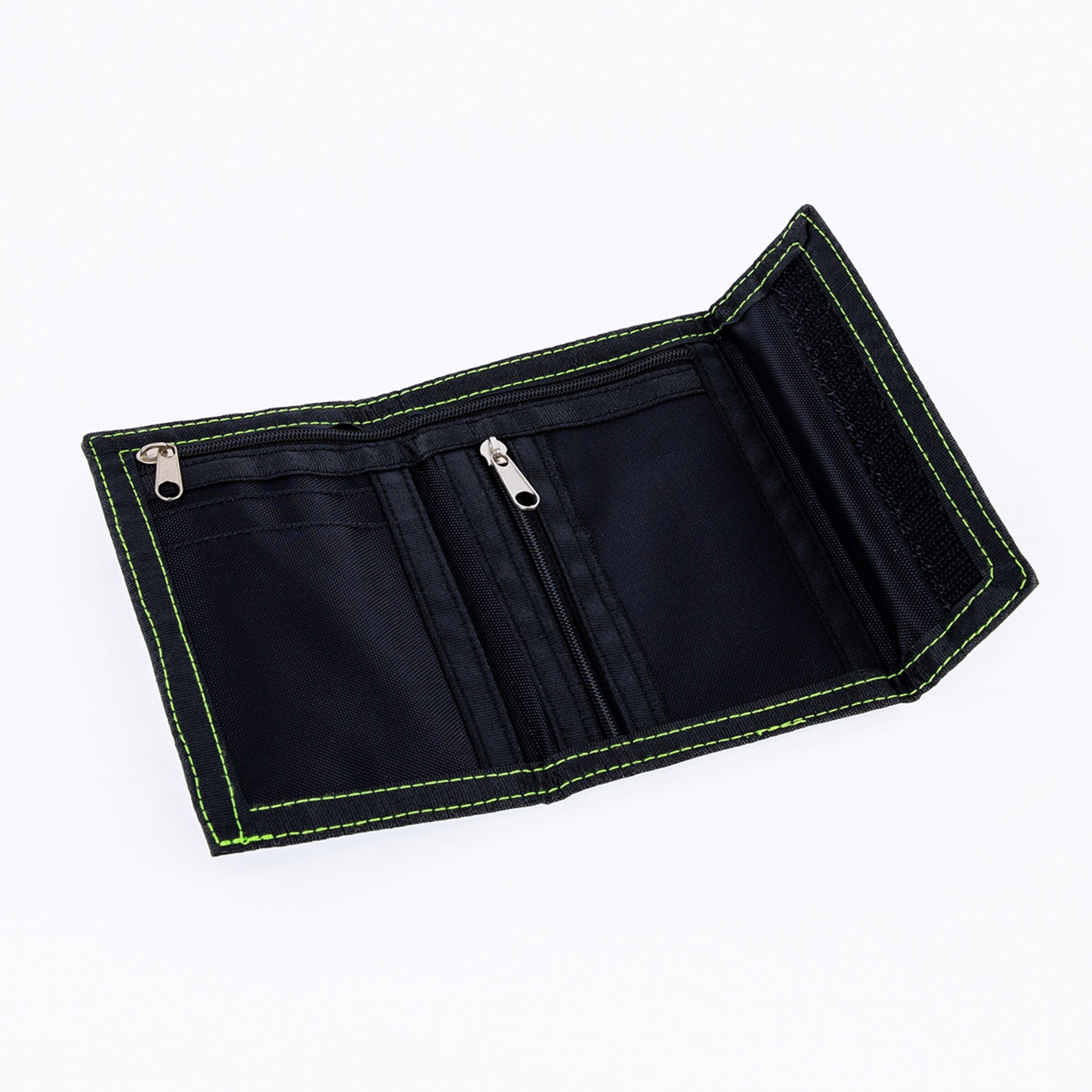 An open black trifold wallet made of fabric, featuring bright green stitching, two zippered compartments, and a Velcro closure. The wallet is displayed unfolded on a white background.