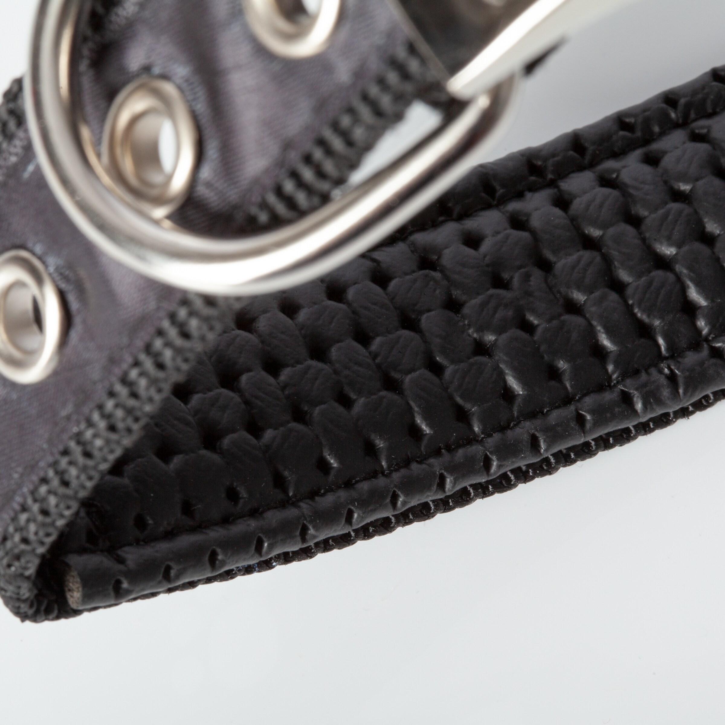 Black woven dog leash with metal buckle.