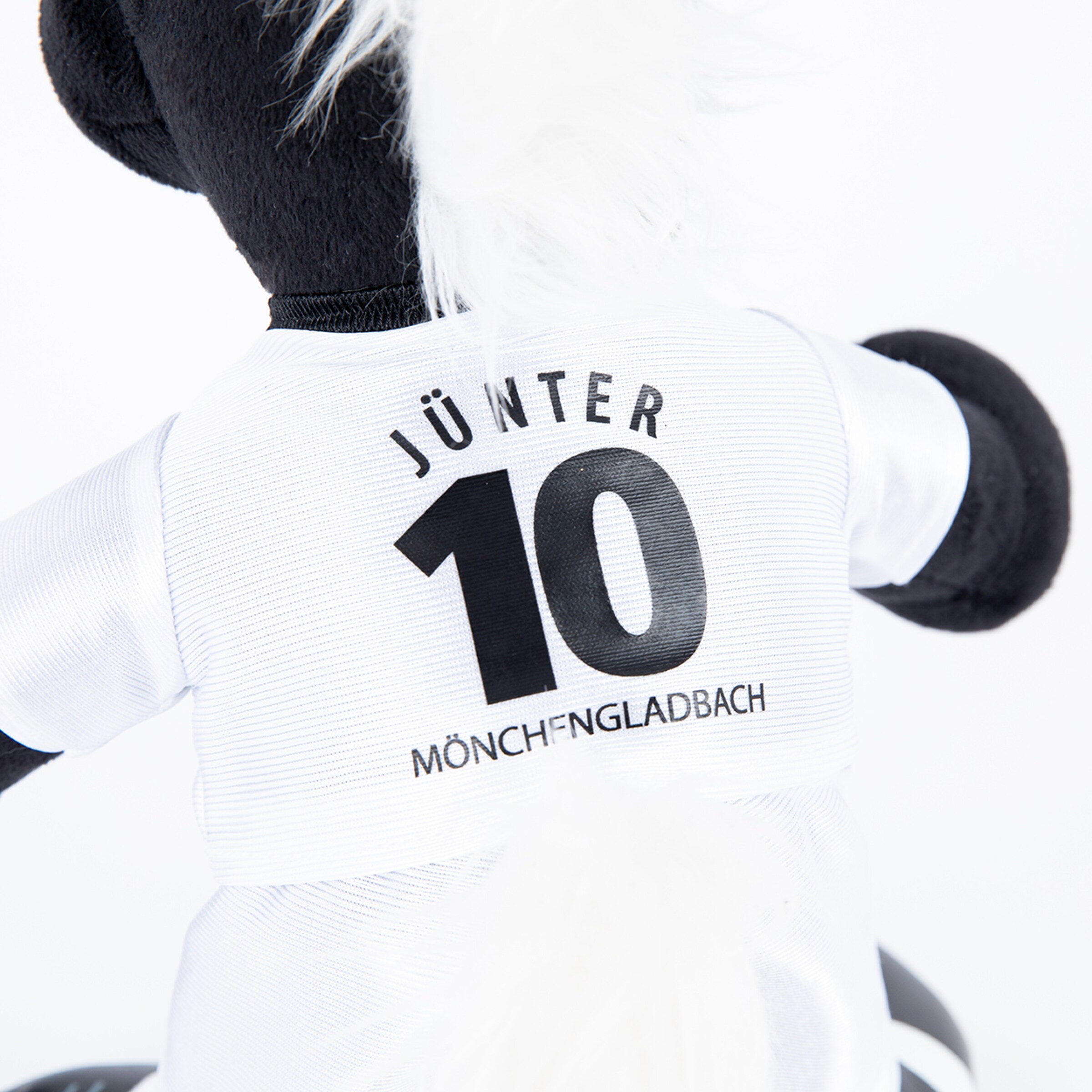Plüschtier Jünter in Mönchengladbach-Trikot mit der Nummer 10.