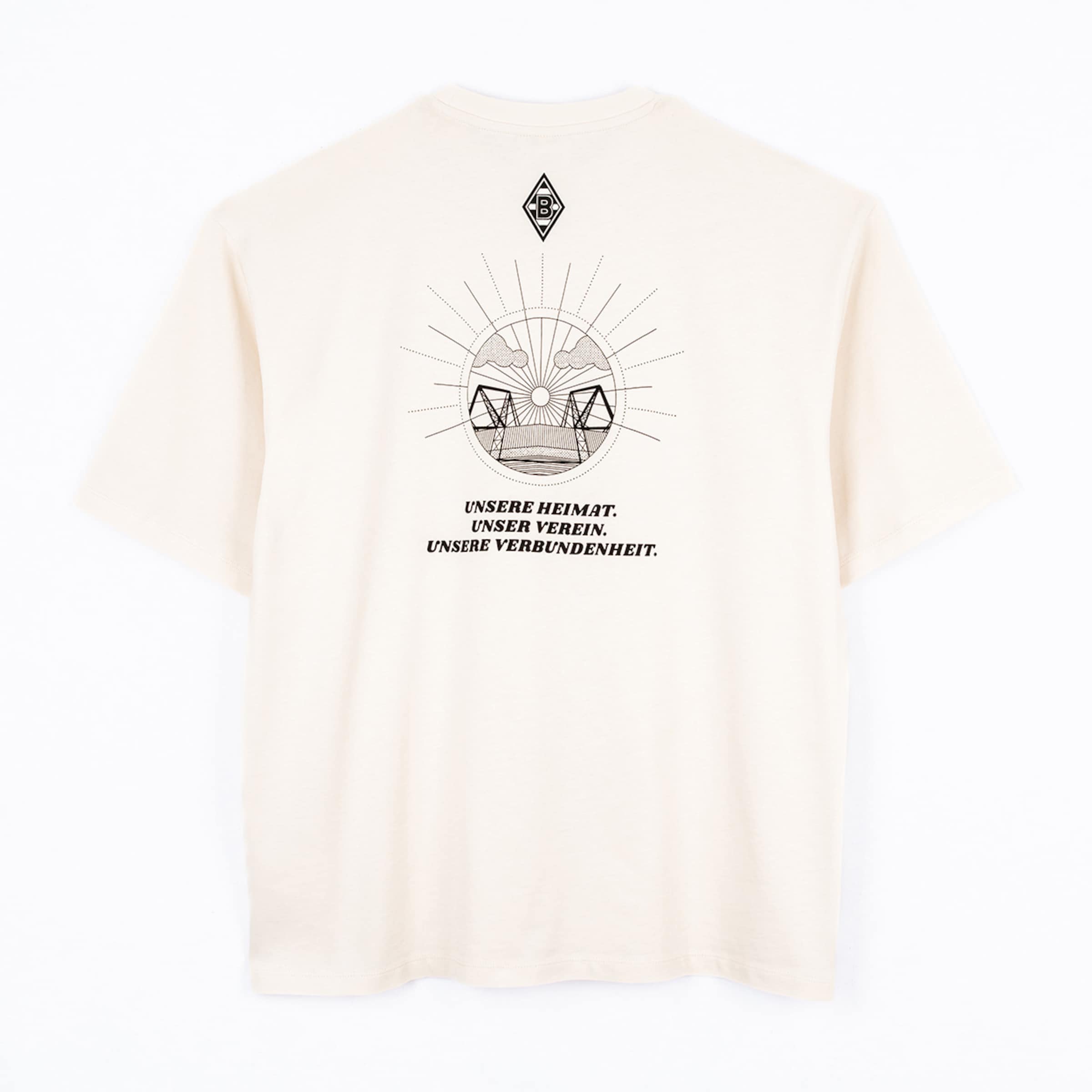Back of a beige t-shirt with BMG logo, circular bridge graphic, and text "UNSERE HEIMAT. UNSER VEREIN. UNSERE VERBUNDENHEIT."