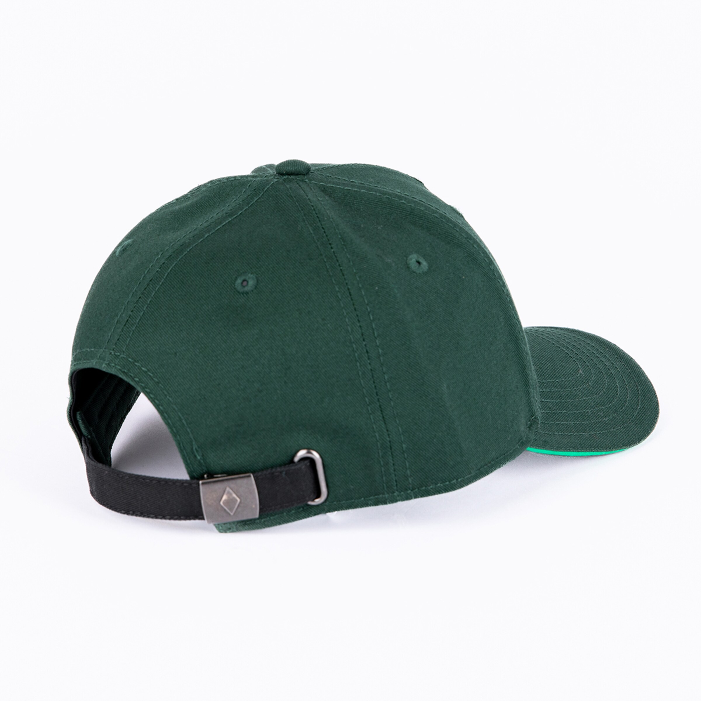 Rear view of a dark green cap with a black strap, metal buckle with diamond logo, and green undervisor on a white background.