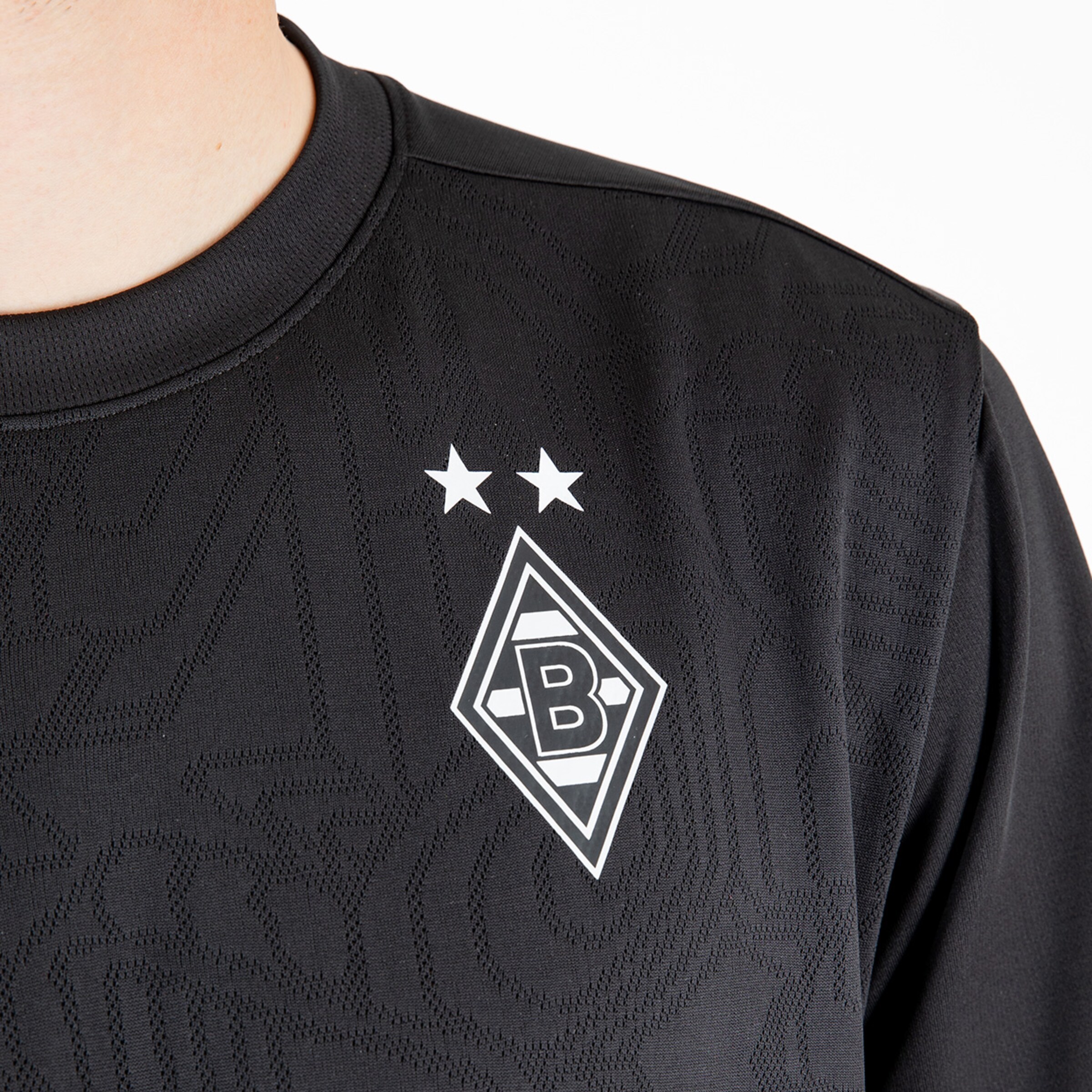 Schwarzes Trikot von Borussia Mönchengladbach mit Vereinslogo und zwei Sternen.