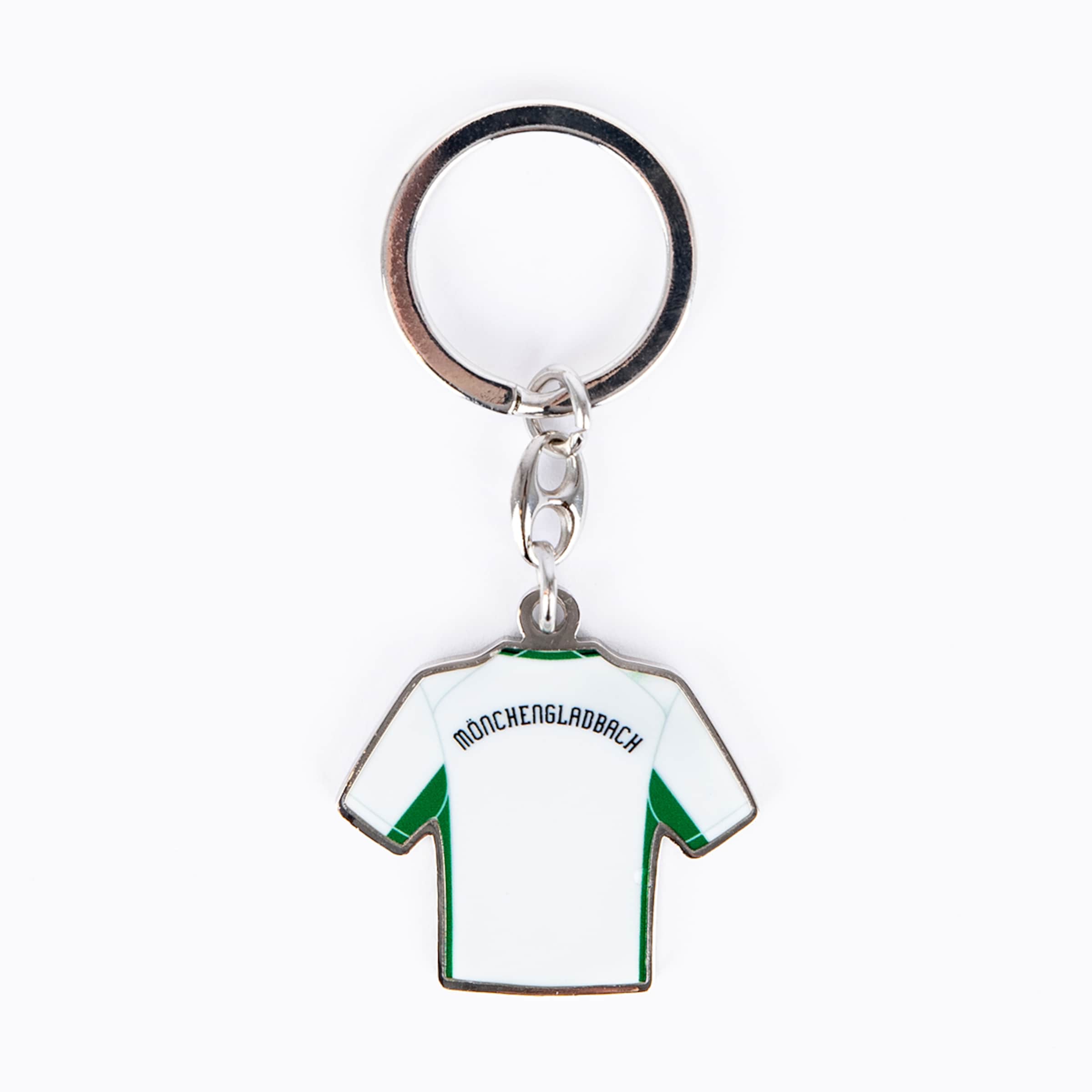Schlüsselanhänger in Form eines weißen Trikots mit grünen Seitenakzenten und dem schwarzen Schriftzug „MÖNCHENGLADBACH“.