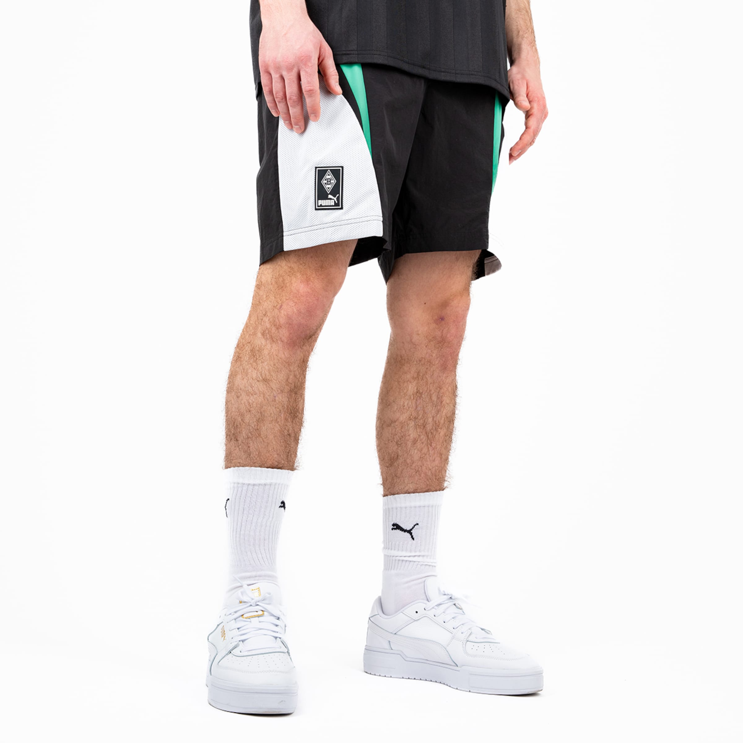 Modische Fußballshorts in Schwarz mit Vereinslogo von Borussia Mönchengladbach.