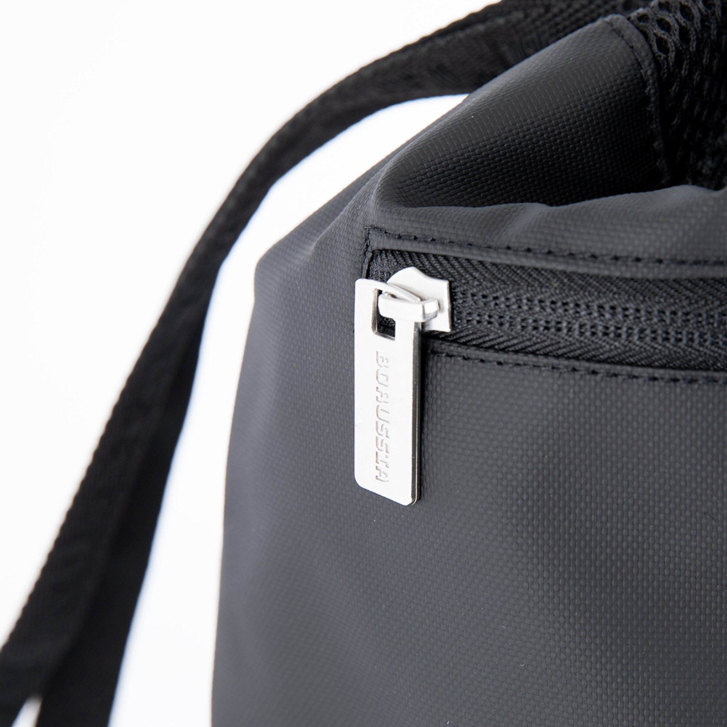 Black sports bag with silver zipper pull and carrying strap.