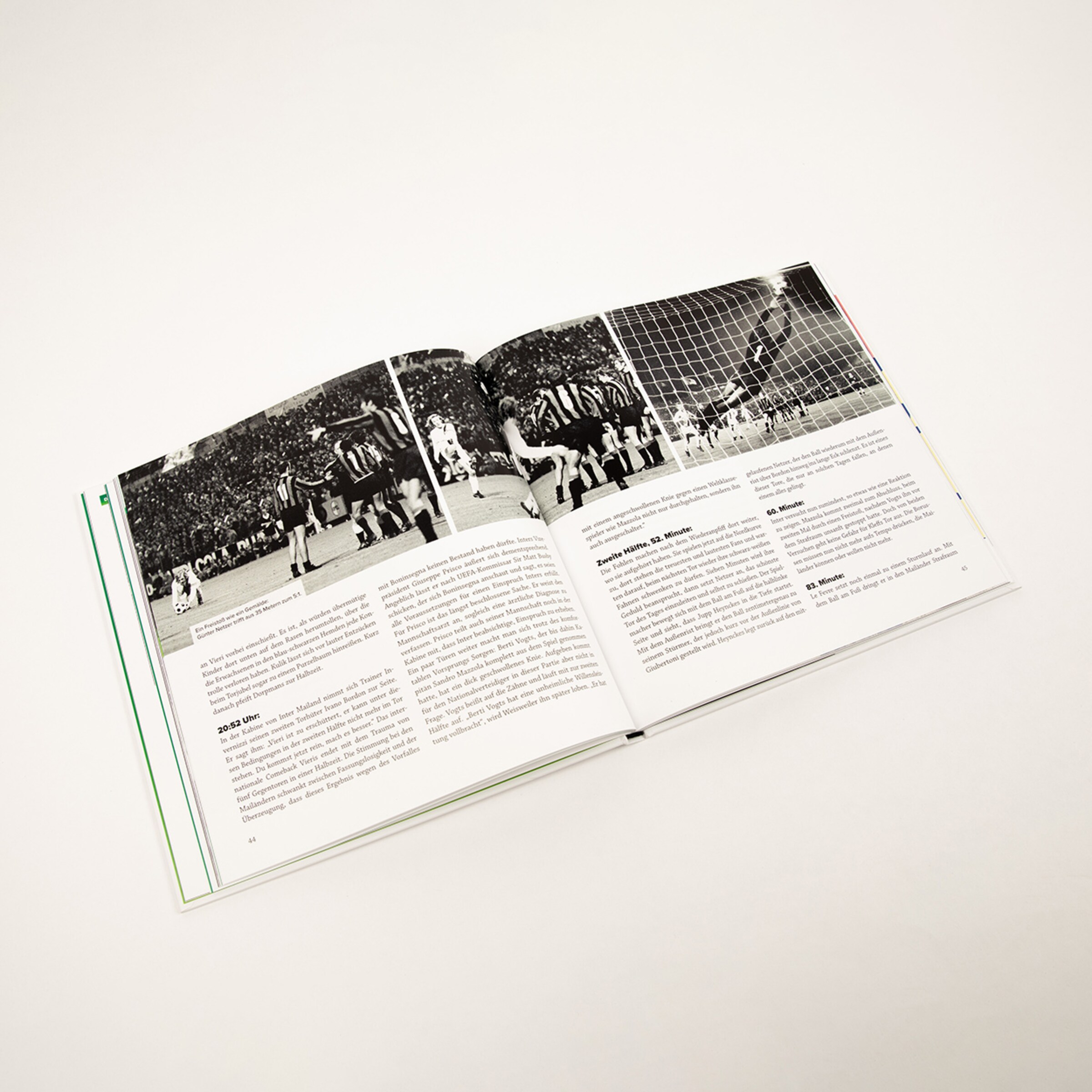 Opened book page featuring black-and-white photos of a soccer match with accompanying text.