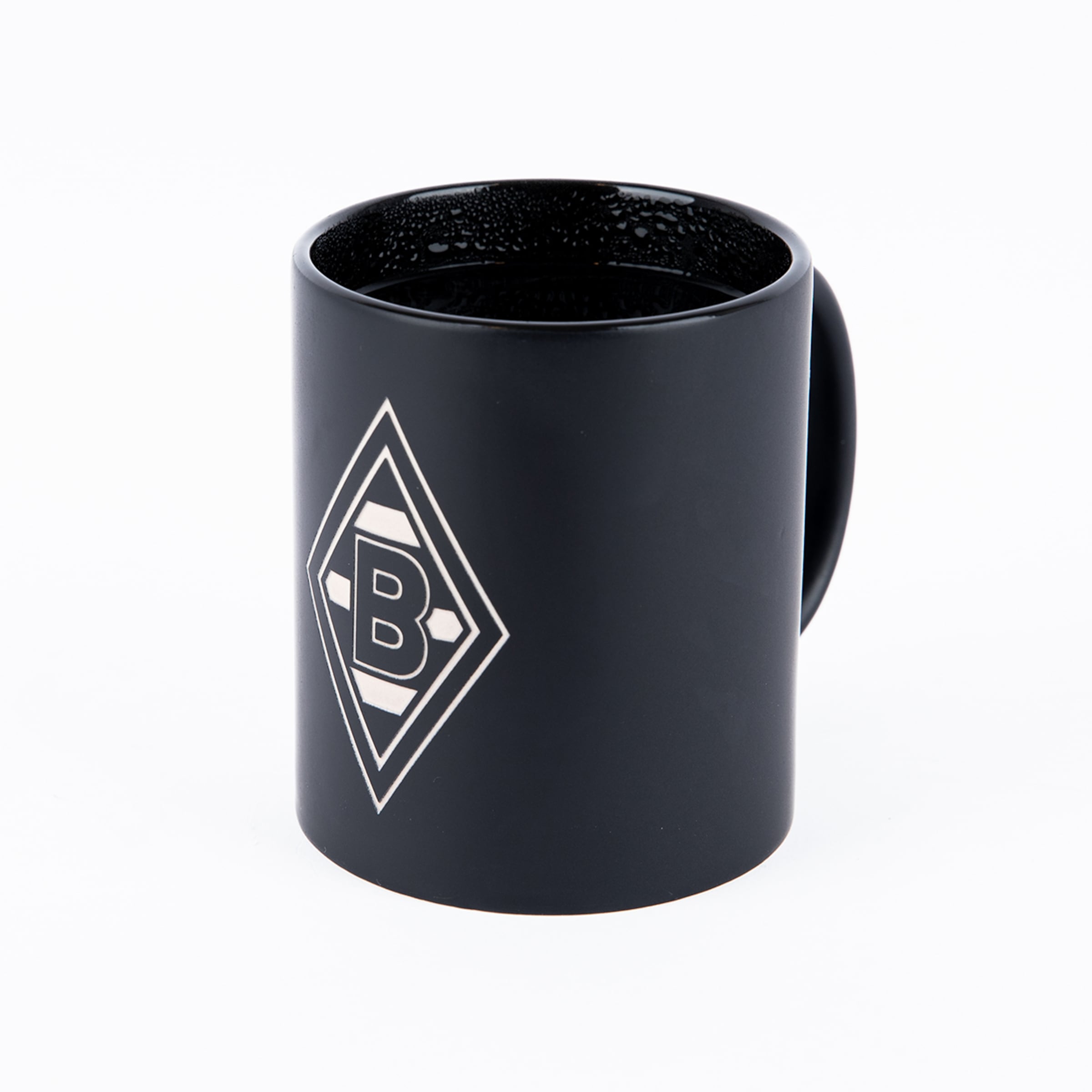 Black matte mug with the white Borussia Mönchengladbach logo on a white background.