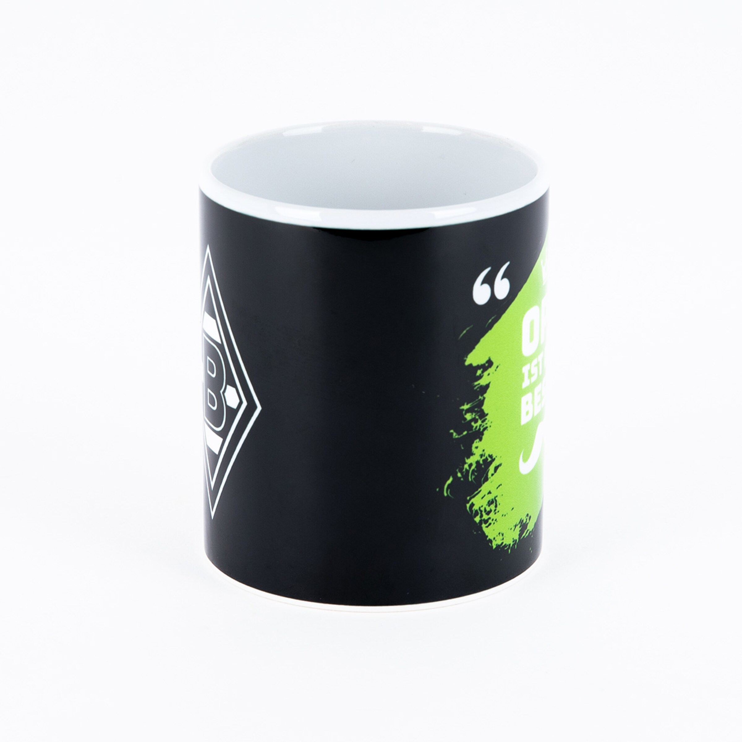 Black mug featuring Borussia Mönchengladbach logo and text Ohne ist besser in neon color.